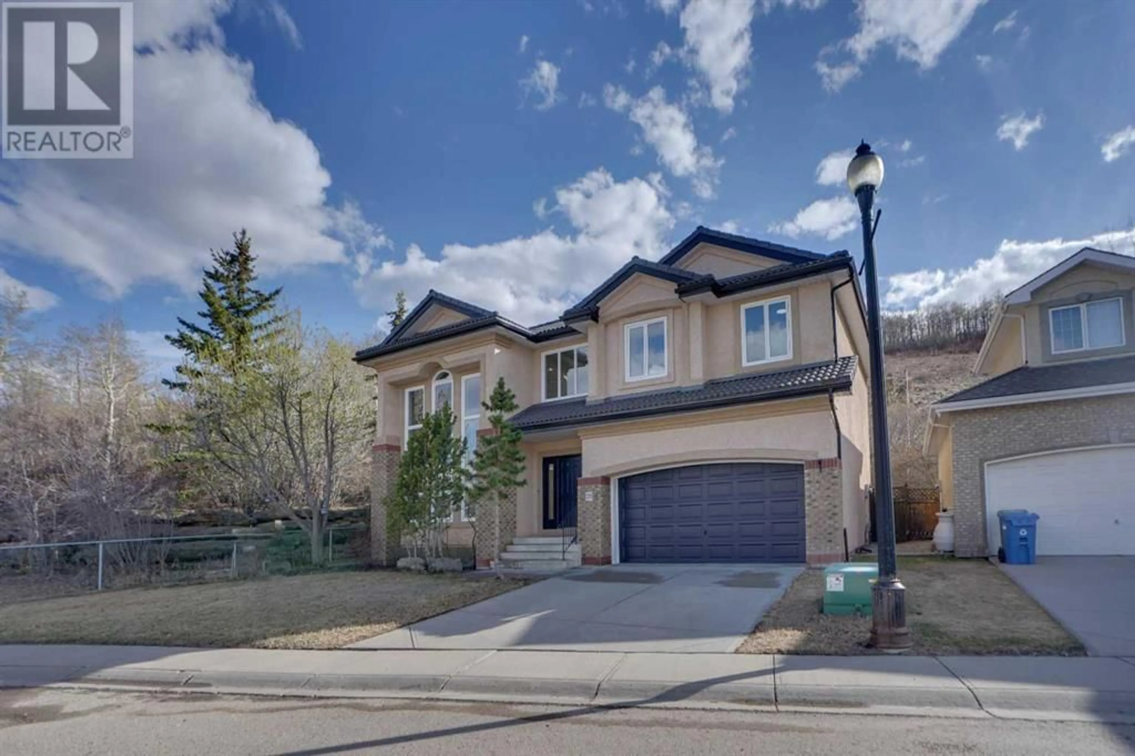 A pic from exterior of the house or condo for 229 Patterson Boulevard SW, Calgary Alberta T3H3J6