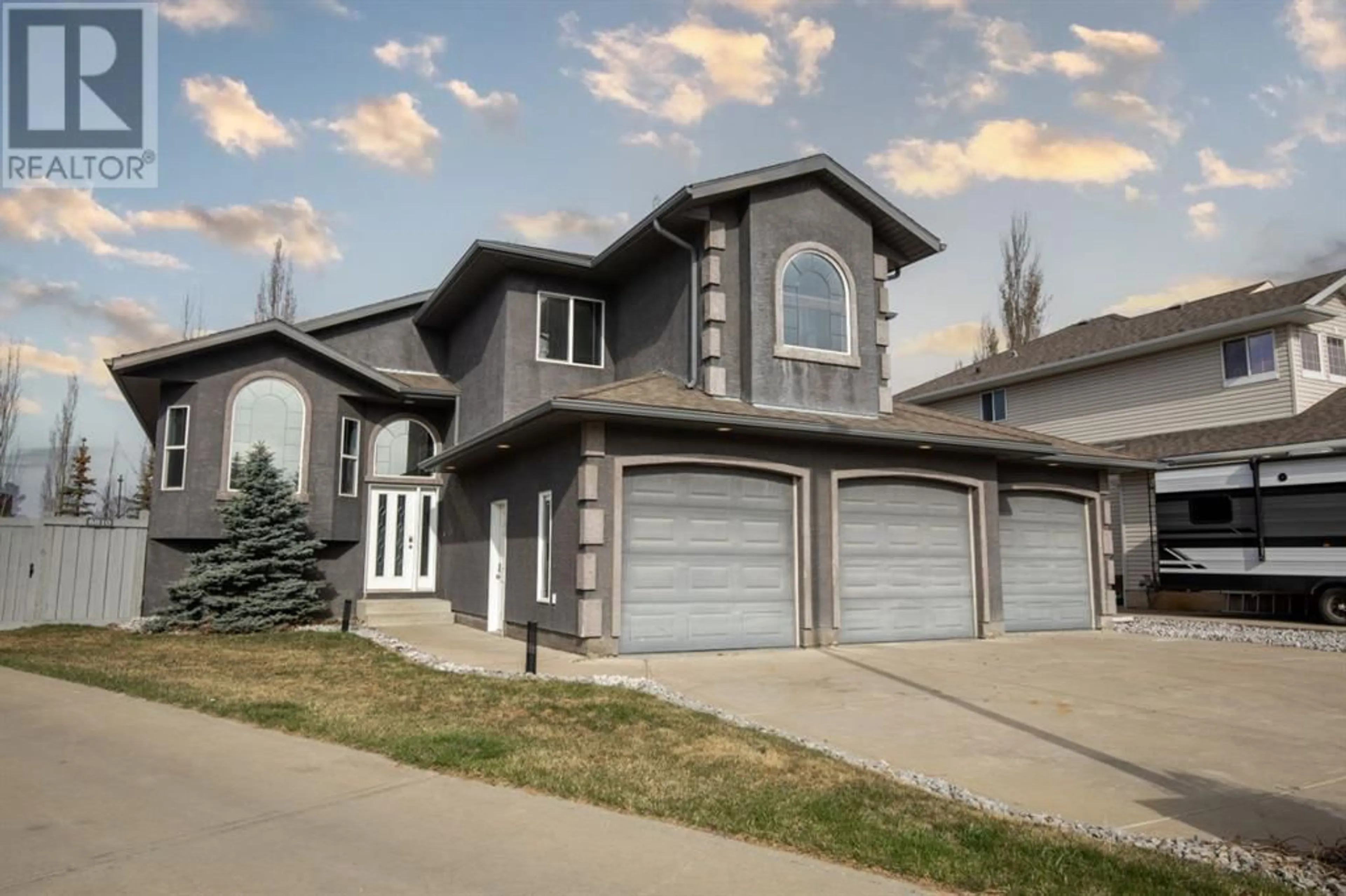 Frontside or backside of a home for 6810 102 Street, Grande Prairie Alberta T8W2Y4