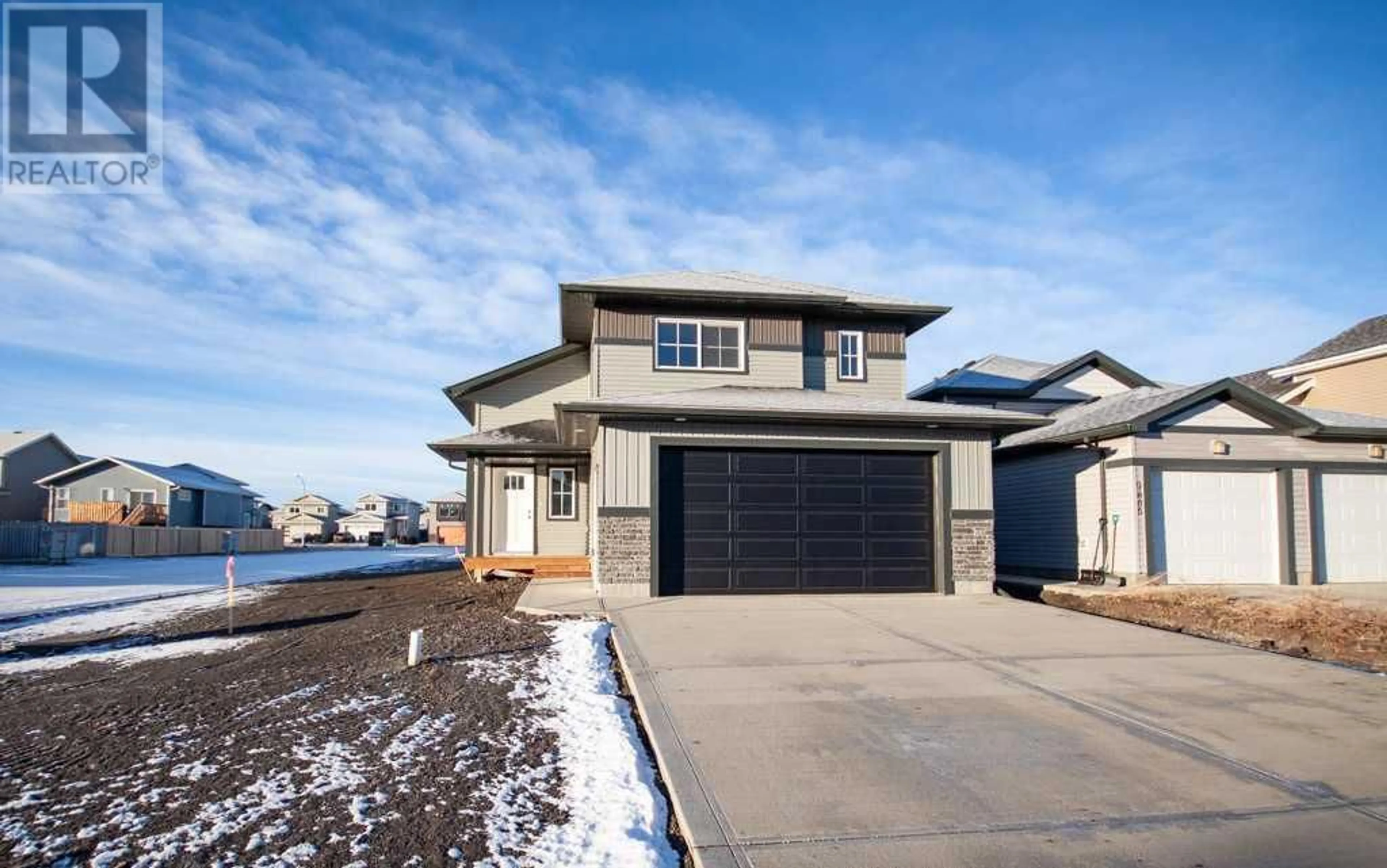 Frontside or backside of a home for 9802 89 Street, Grande Prairie Alberta T8X0R3