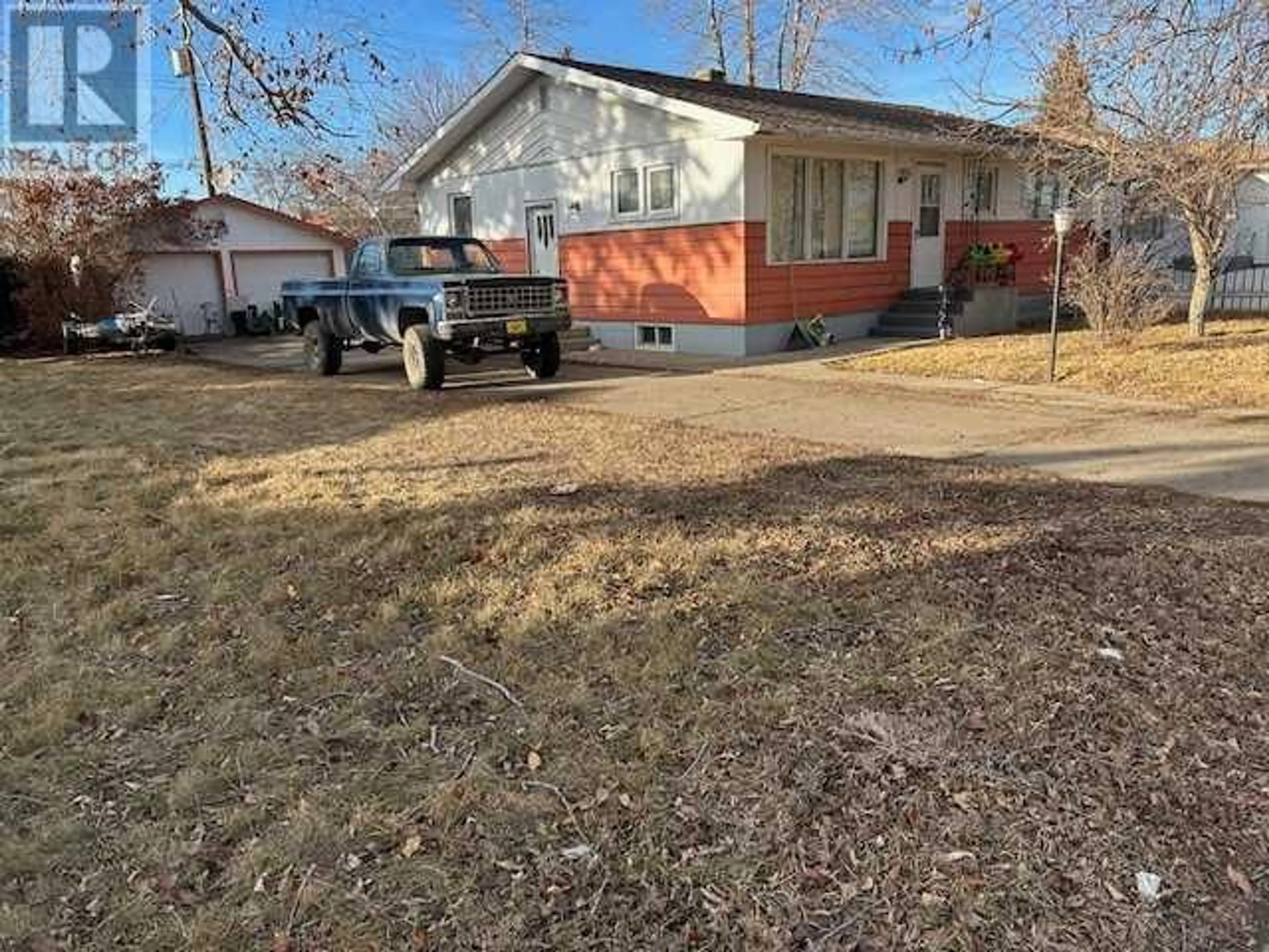 Frontside or backside of a home for 419 2 Street W, Brooks Alberta T1R0E8