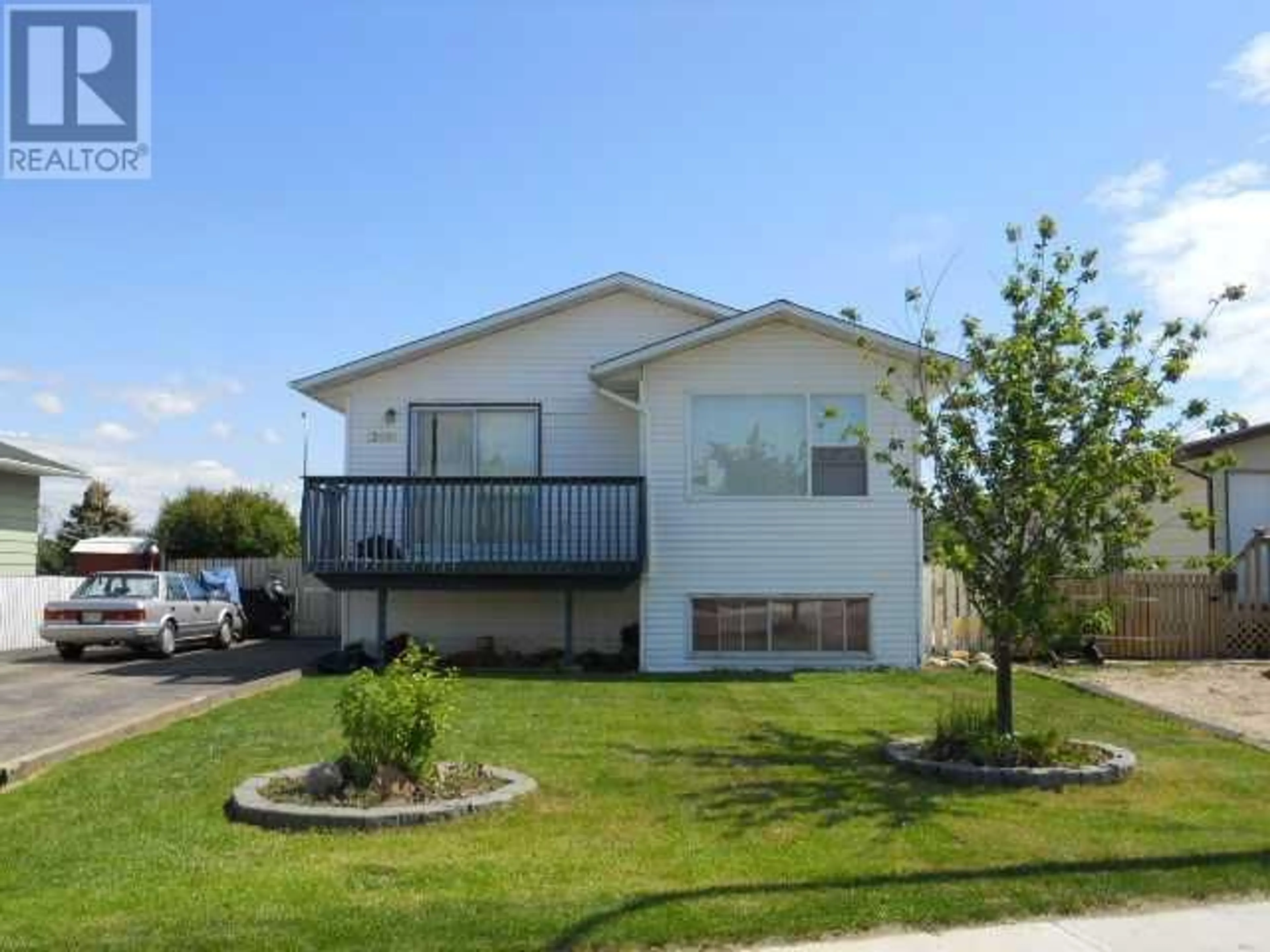Frontside or backside of a home for 12401 94A Street, Grande Prairie Alberta T8V5X7
