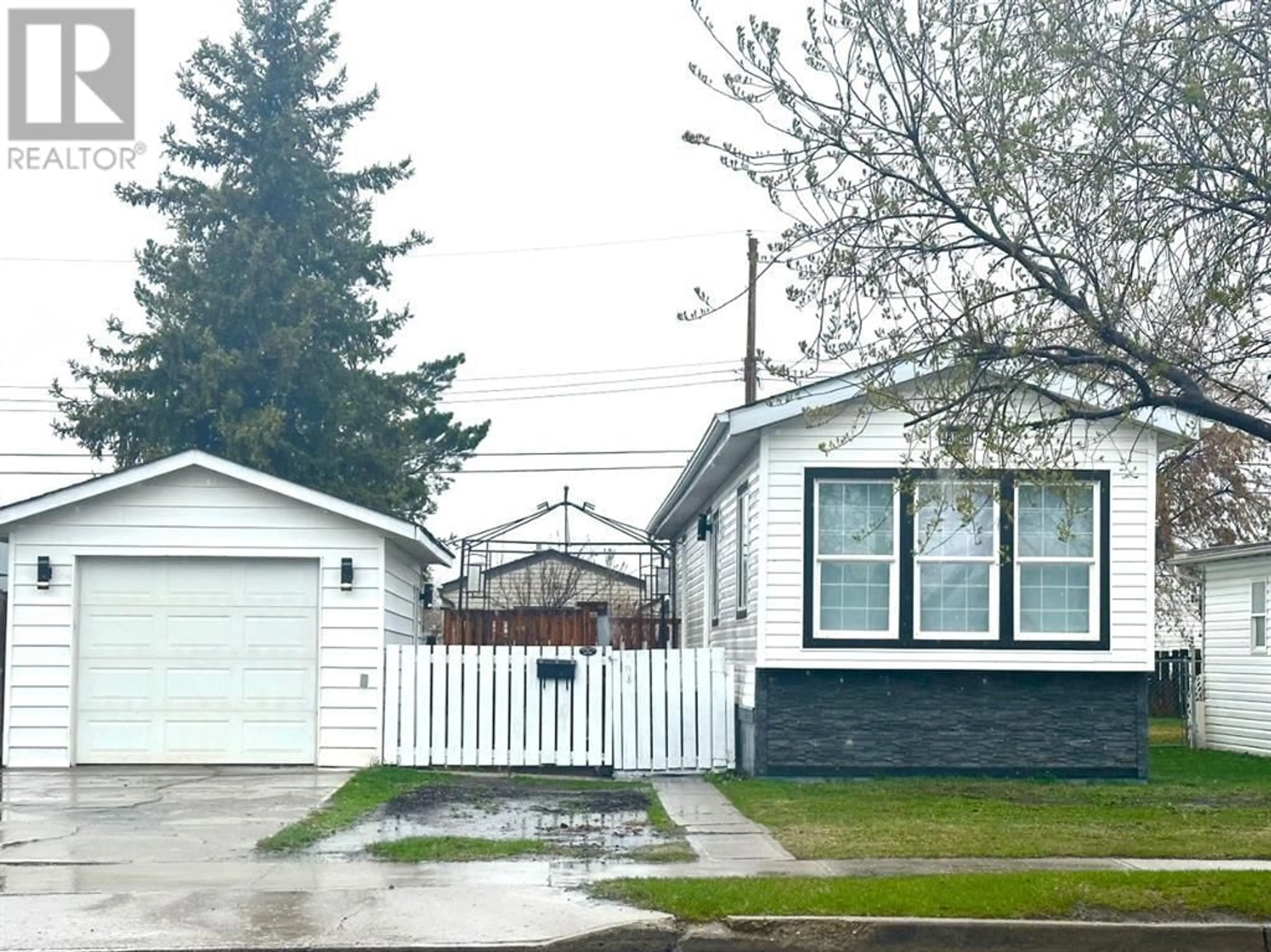 Frontside or backside of a home for 4804D 54 Avenue, Camrose Alberta T4V3A4