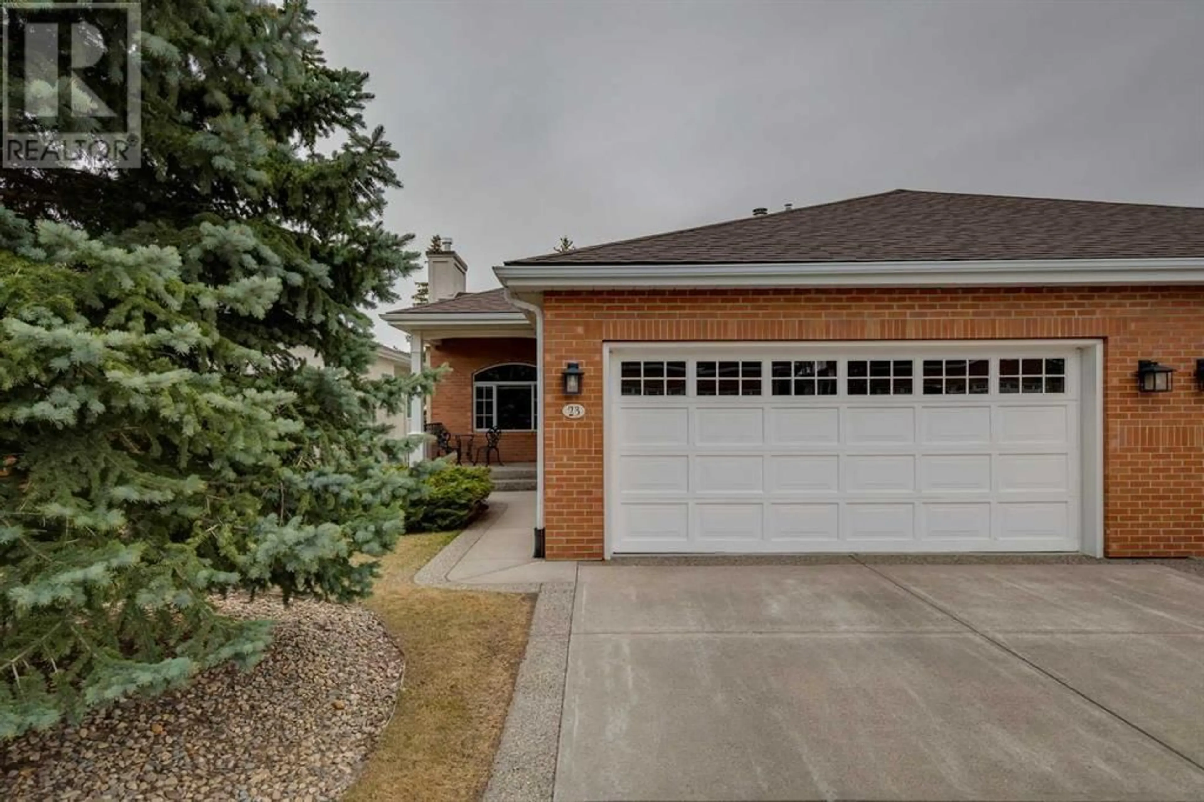 Home with brick exterior material for 23 Prominence Point SW, Calgary Alberta T3H3E8