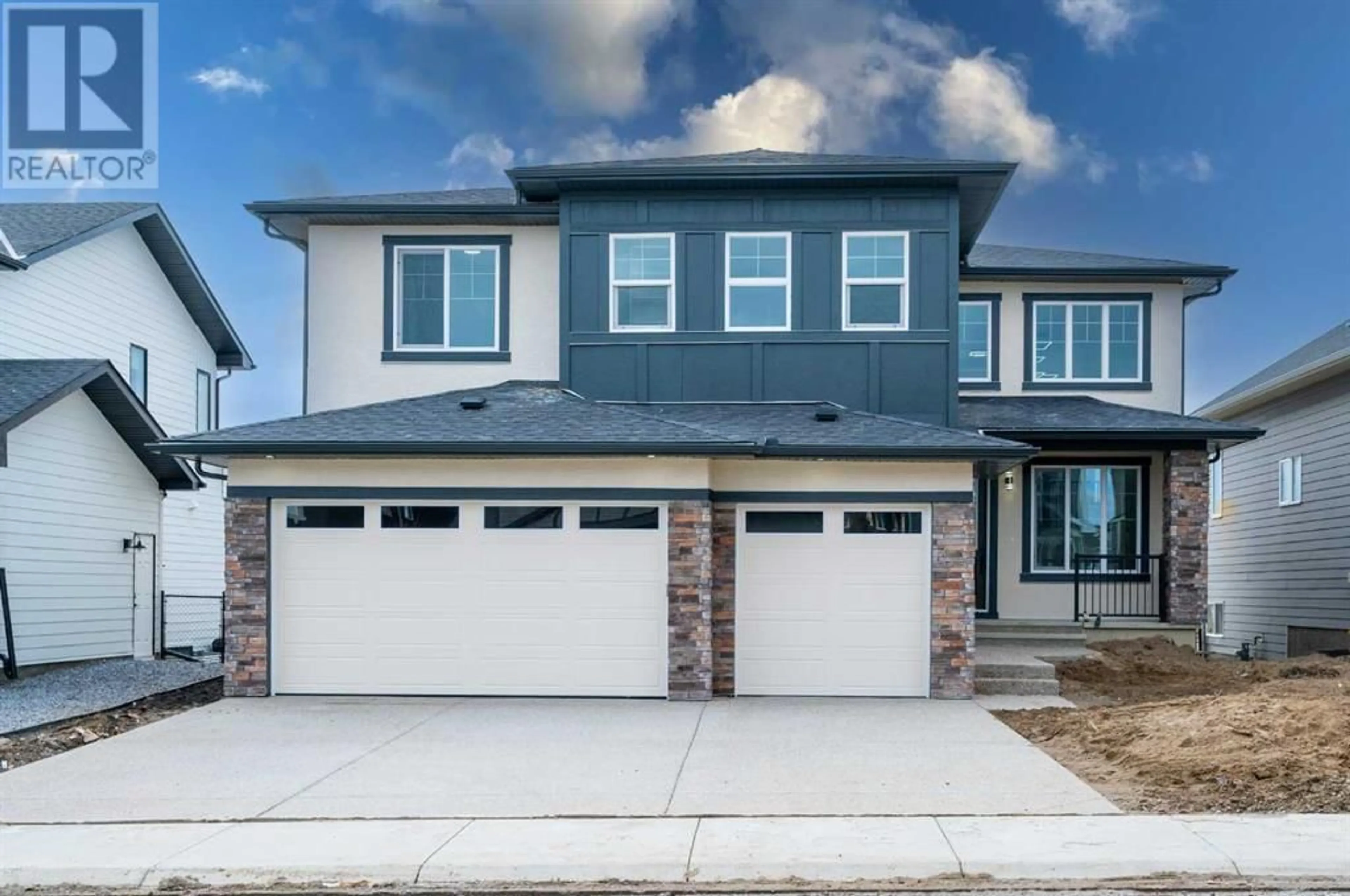 Frontside or backside of a home for 58 Ranchers Meadows, Okotoks Alberta T1S0P5