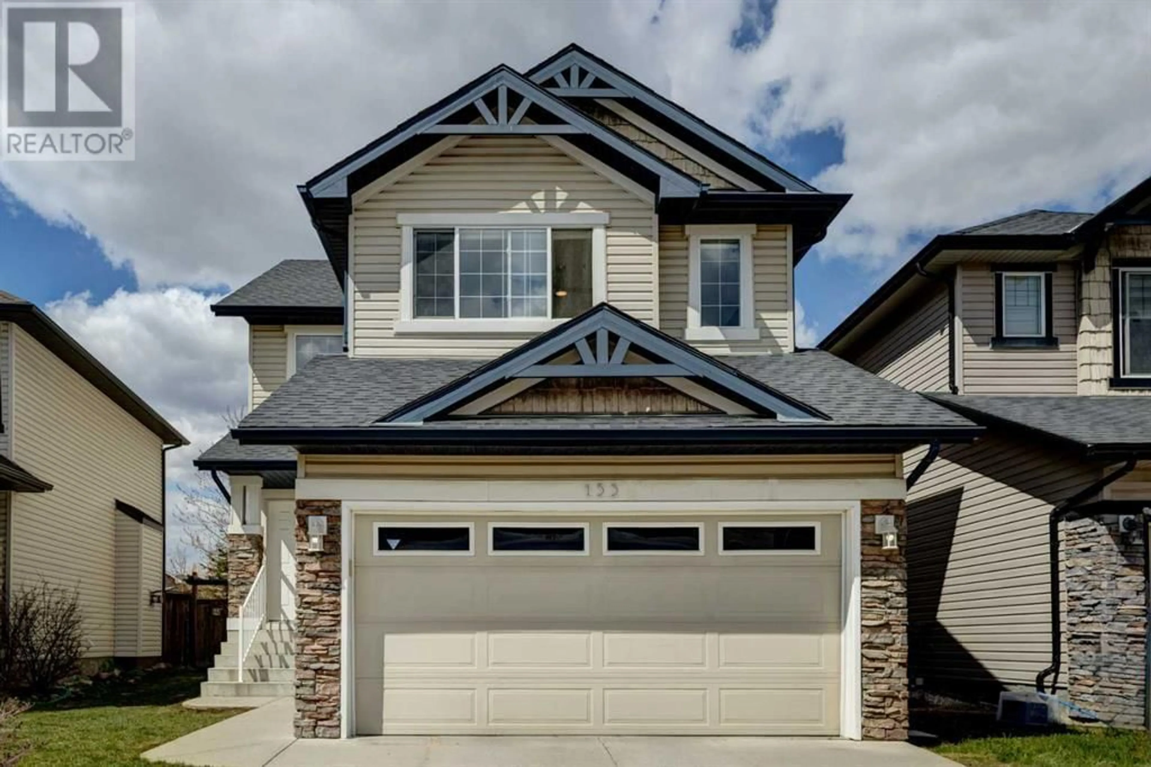 Frontside or backside of a home for 153 Royal Birch Crescent NW, Calgary Alberta T3G5P2