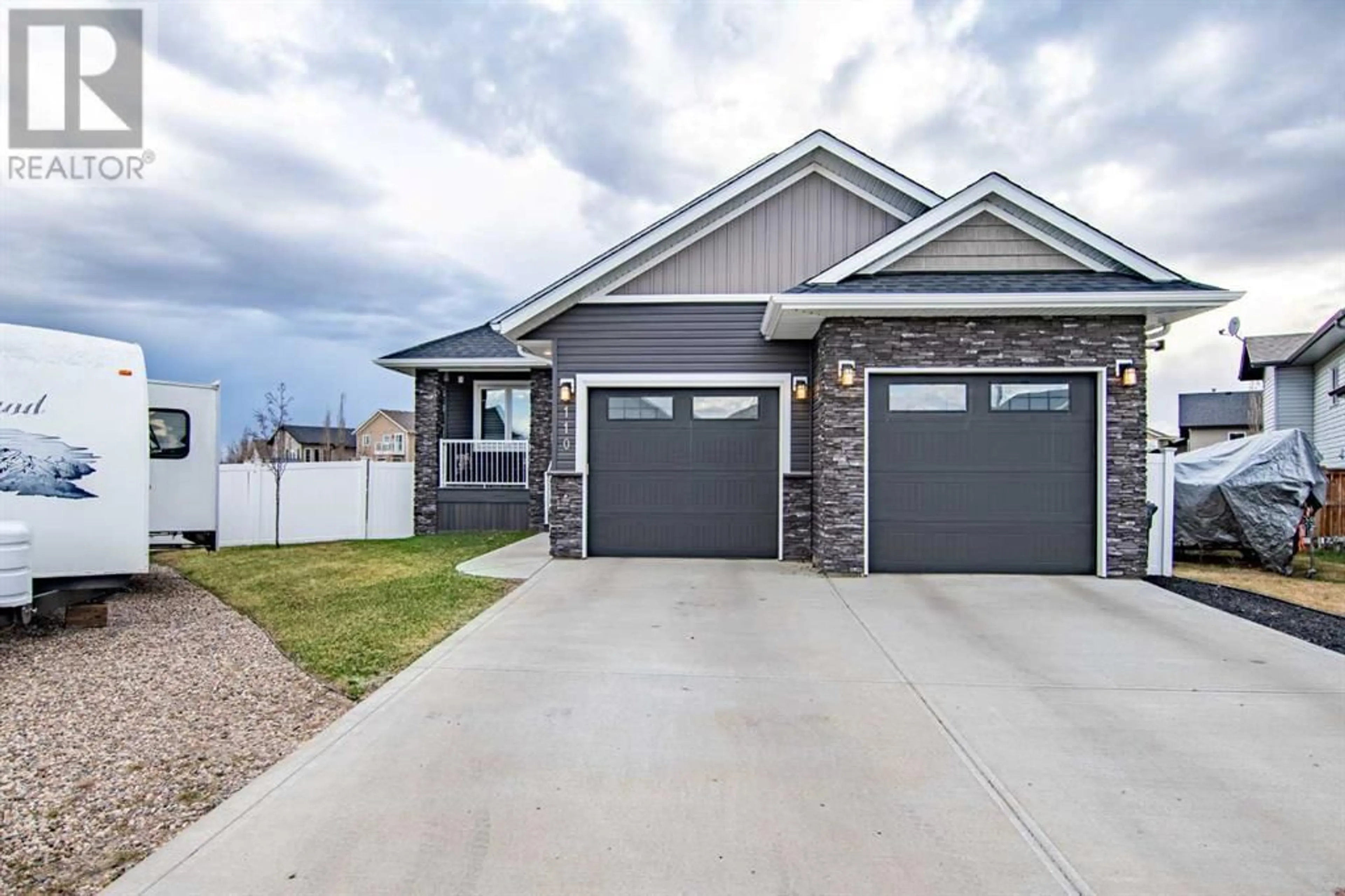 Frontside or backside of a home for 110 Hollman Close, Penhold Alberta T0M1R0