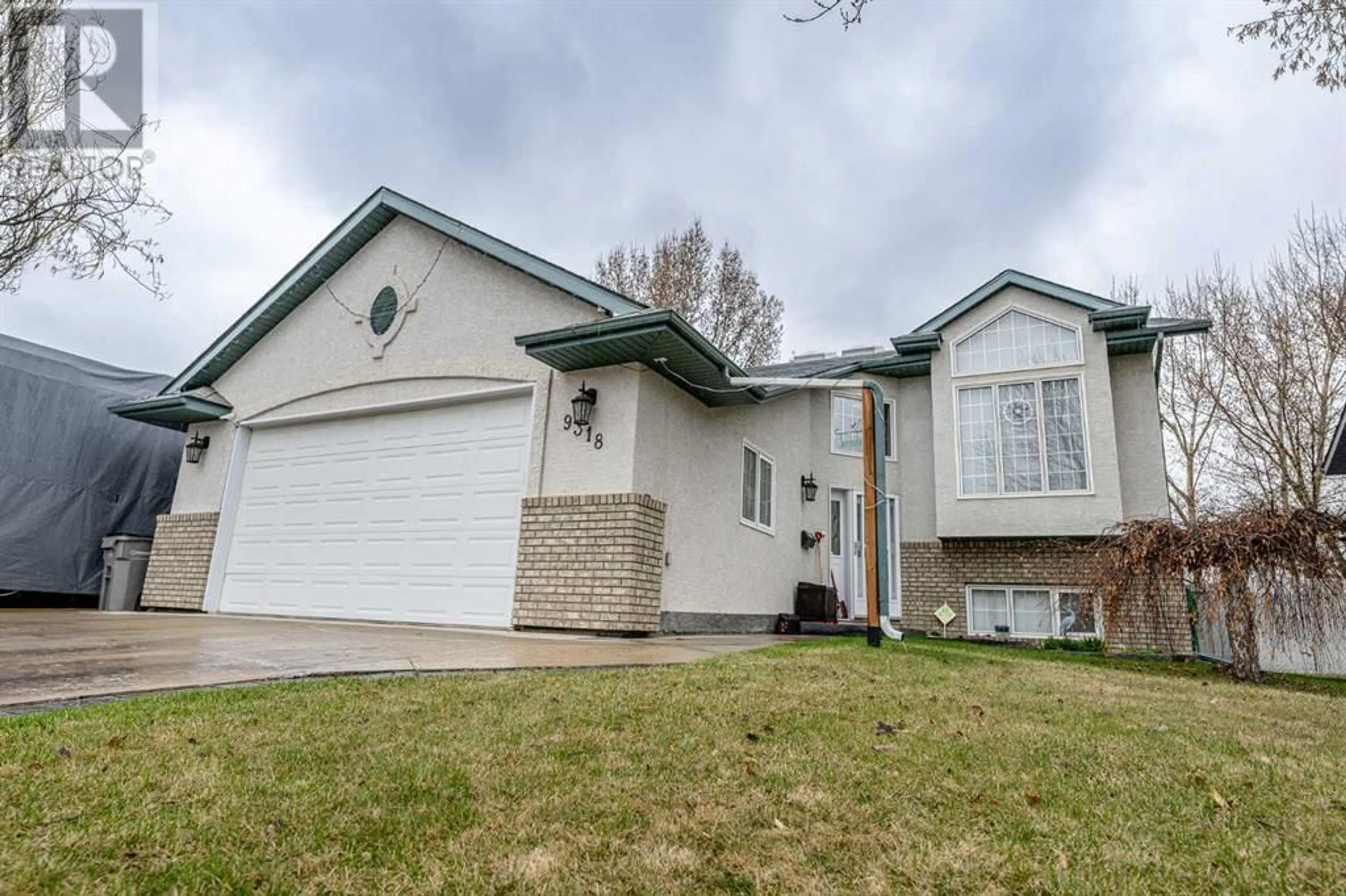 Frontside or backside of a home for 9318 69 Avenue, Grande Prairie Alberta T8V6T4