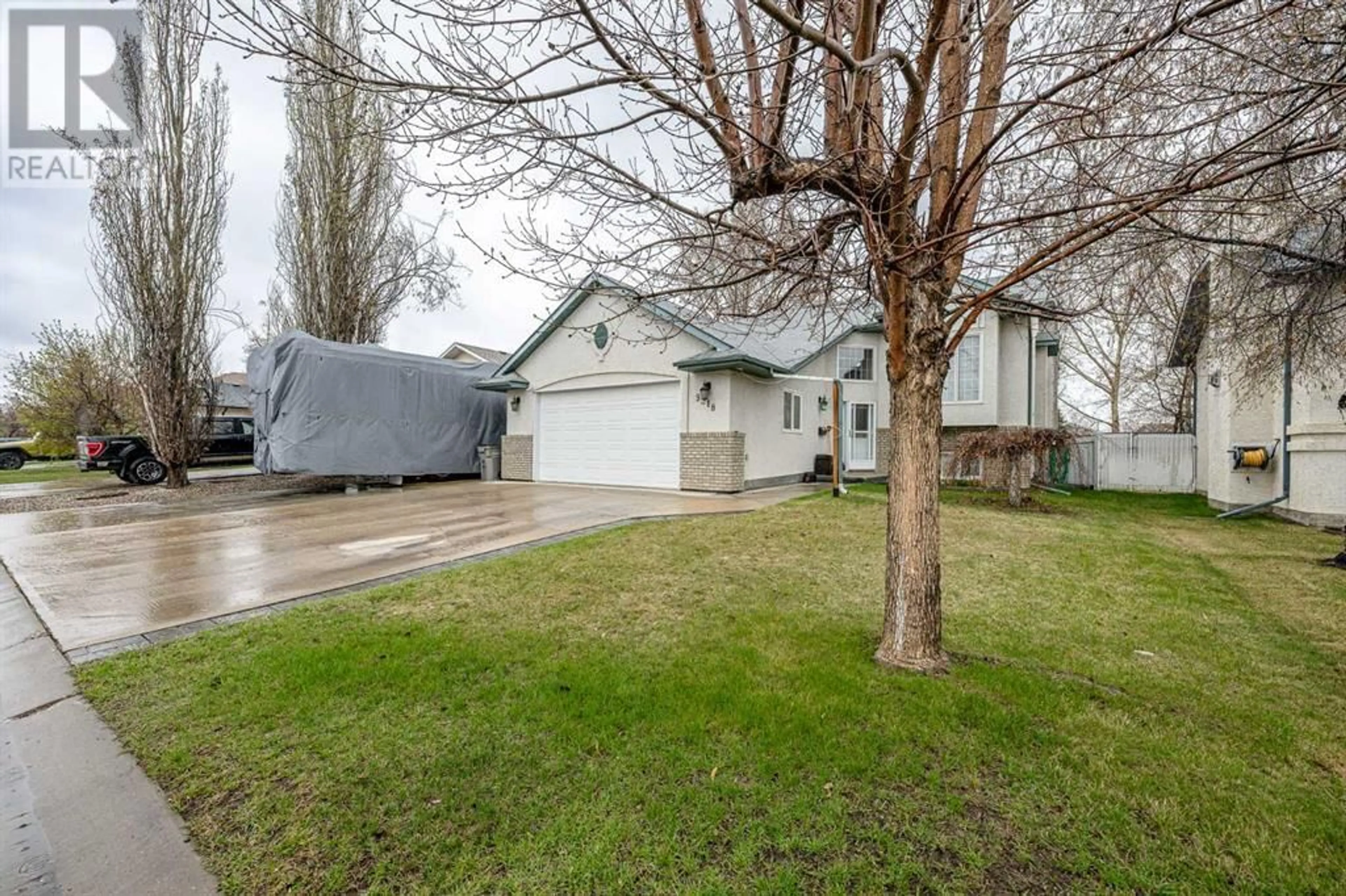 Frontside or backside of a home for 9318 69 Avenue, Grande Prairie Alberta T8V6T4