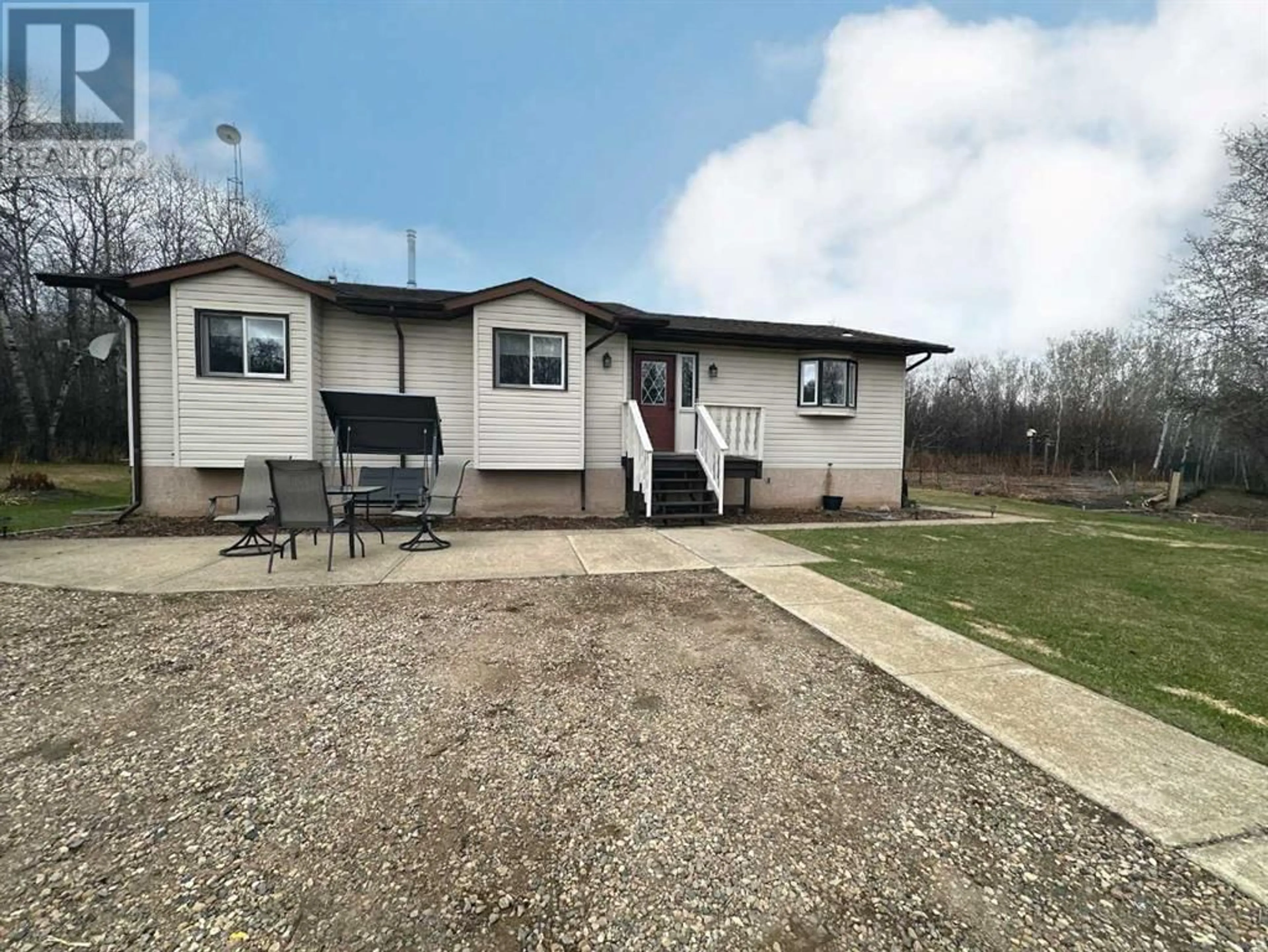 Frontside or backside of a home for 207 Willow Road, Wainwright Alberta T9W1T5