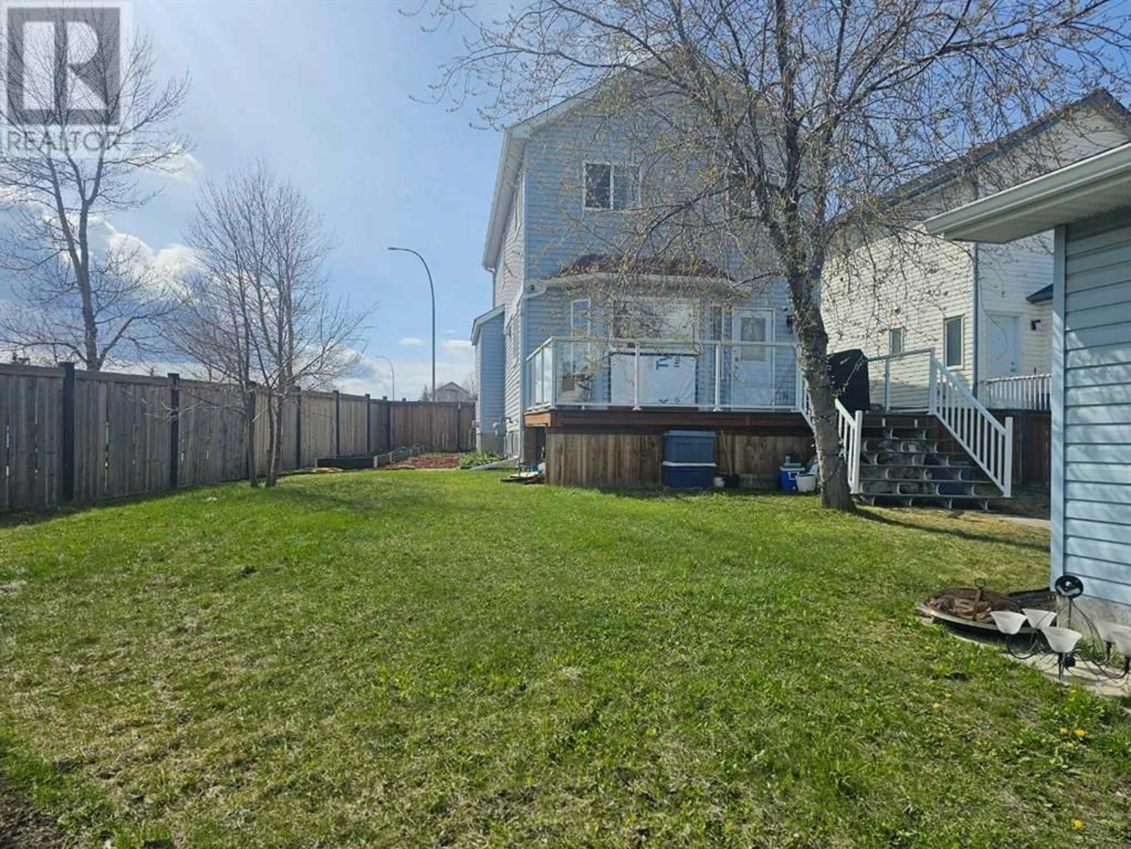 Fenced yard for 118 ARBOUR CRES Circle NW, Calgary Alberta T3G4H1