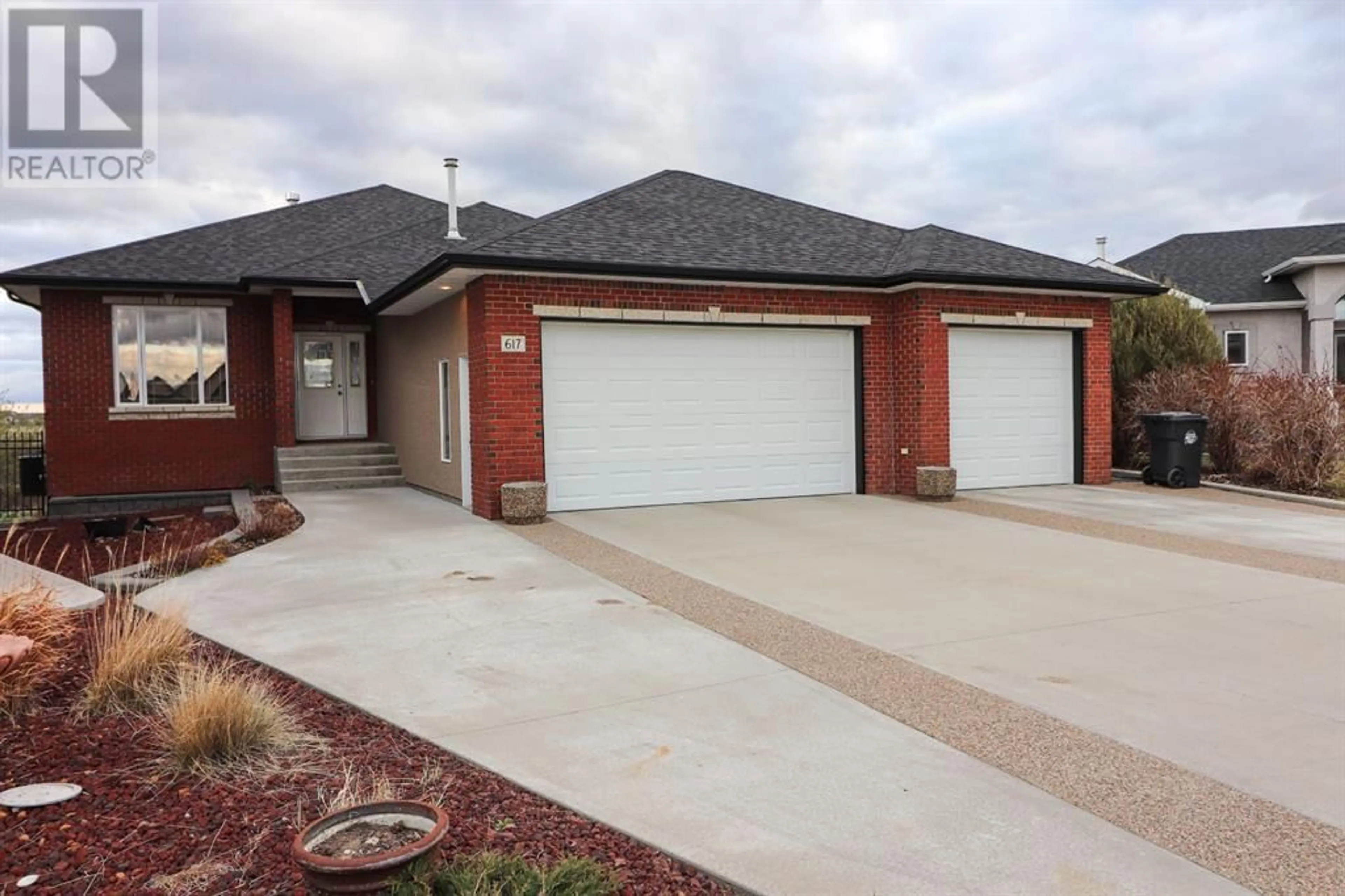 Home with brick exterior material for 617 Jesmond Point, Redcliff Alberta T0J2P2