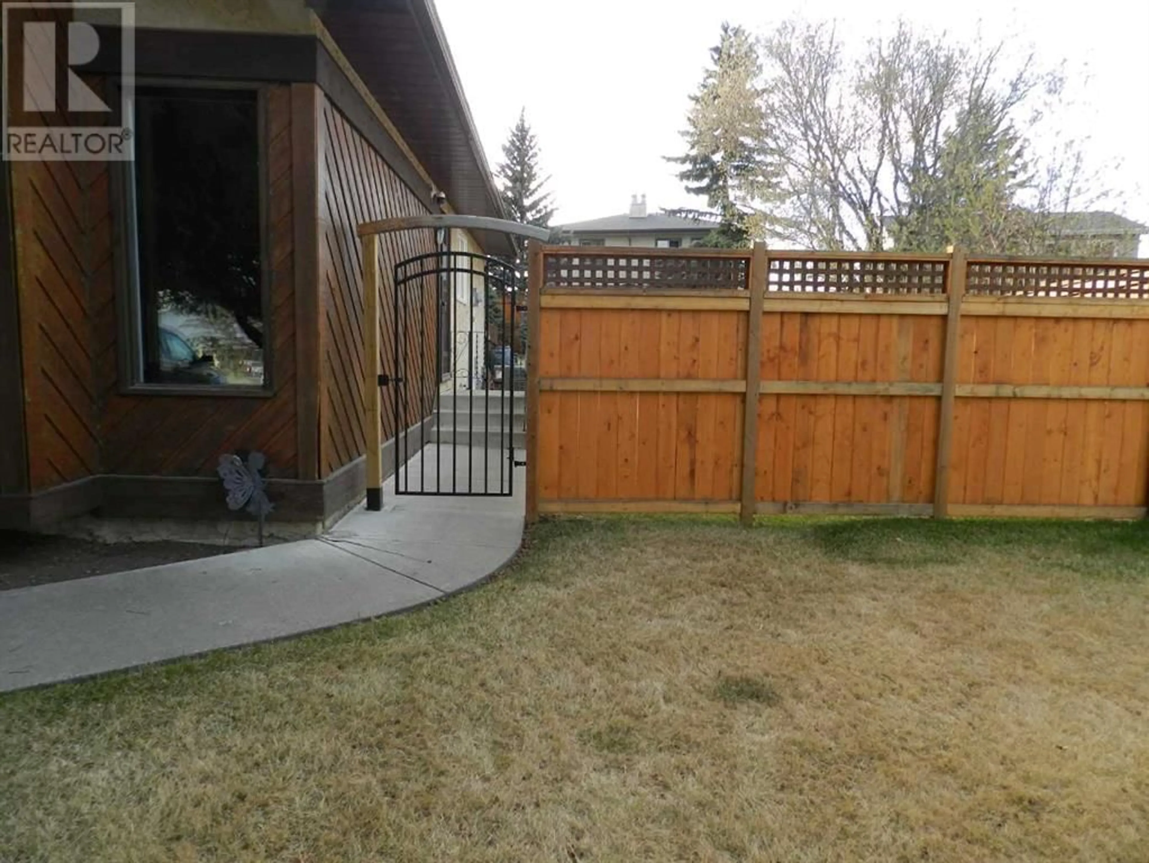 Fenced yard for 10022 84 Street, Peace River Alberta T8S1N3