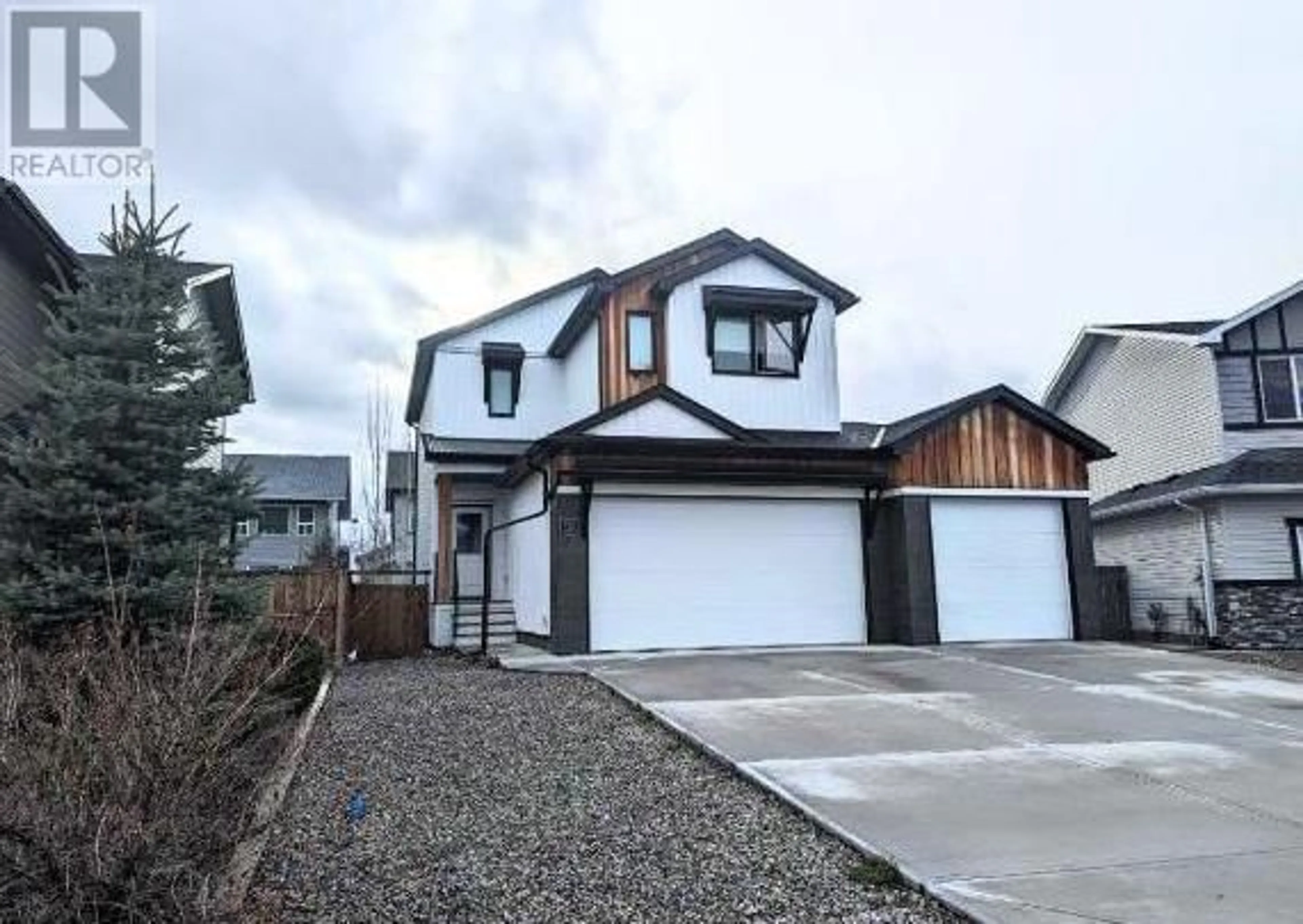 Frontside or backside of a home for 445 Westgate Crescent, Coaldale Alberta T1M0E1