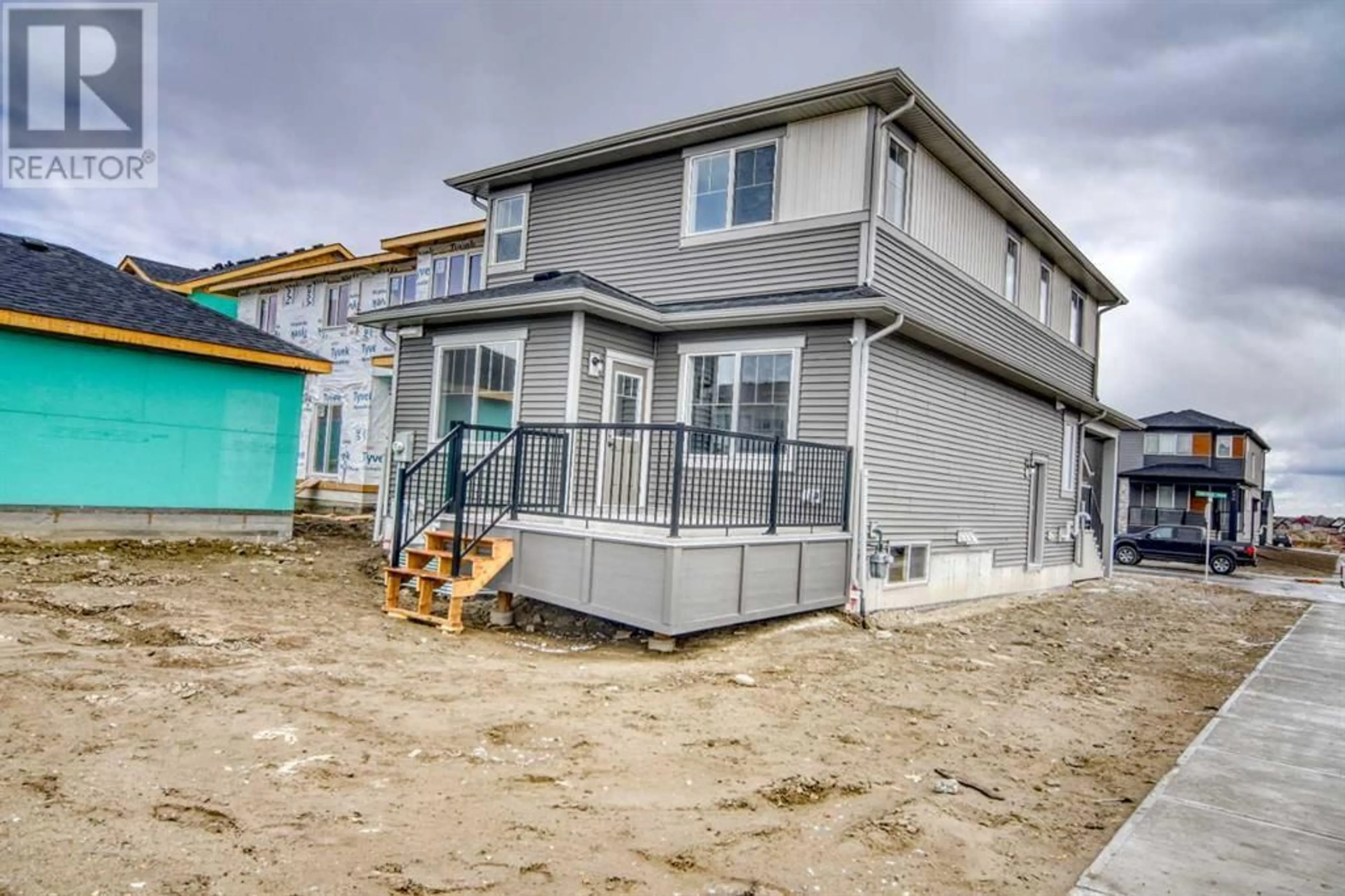 Frontside or backside of a home for 973 Cobblemore Common SW, Airdrie Alberta T4B5M1