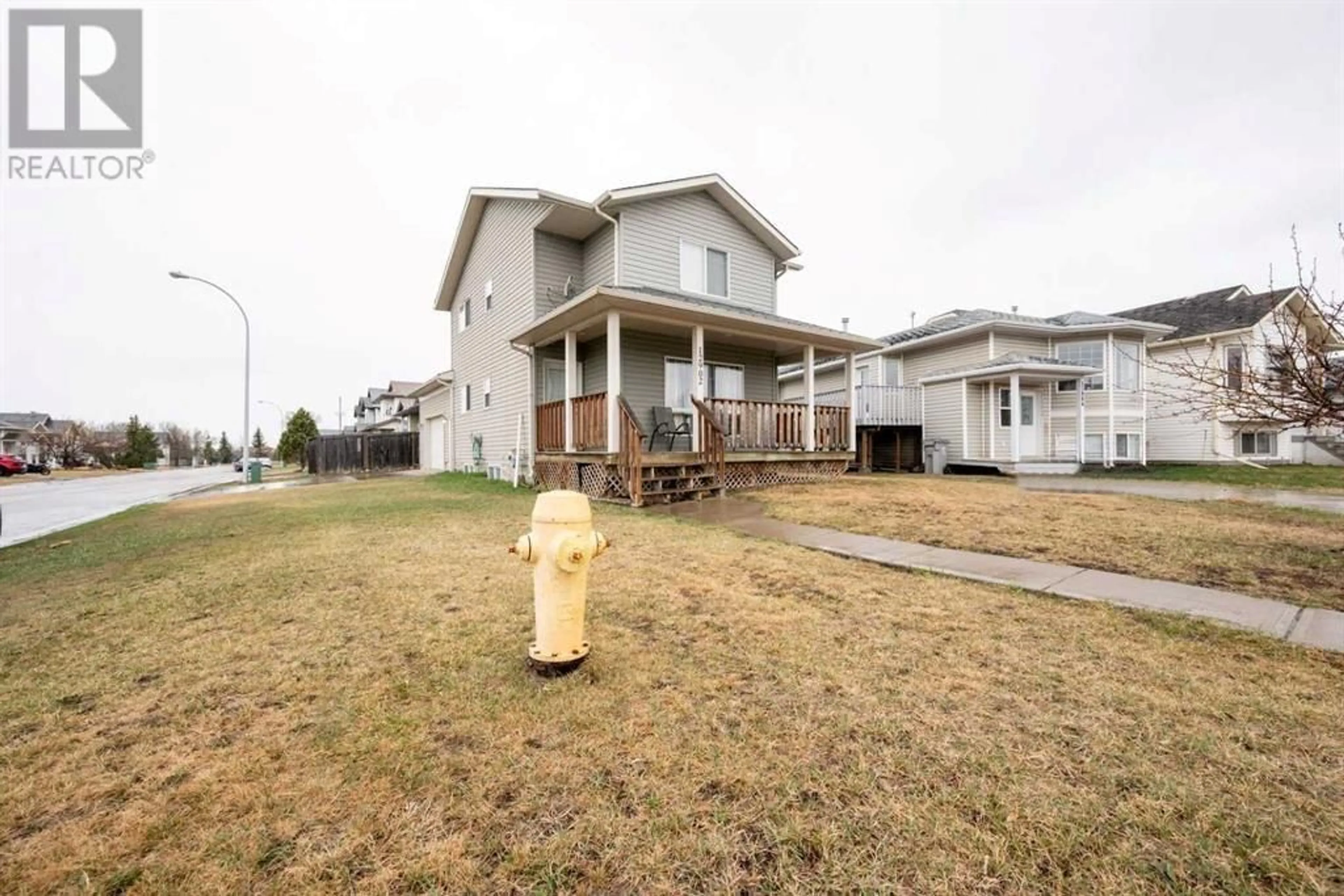 Frontside or backside of a home for 12902 94 Street, Grande Prairie Alberta T8X1R2