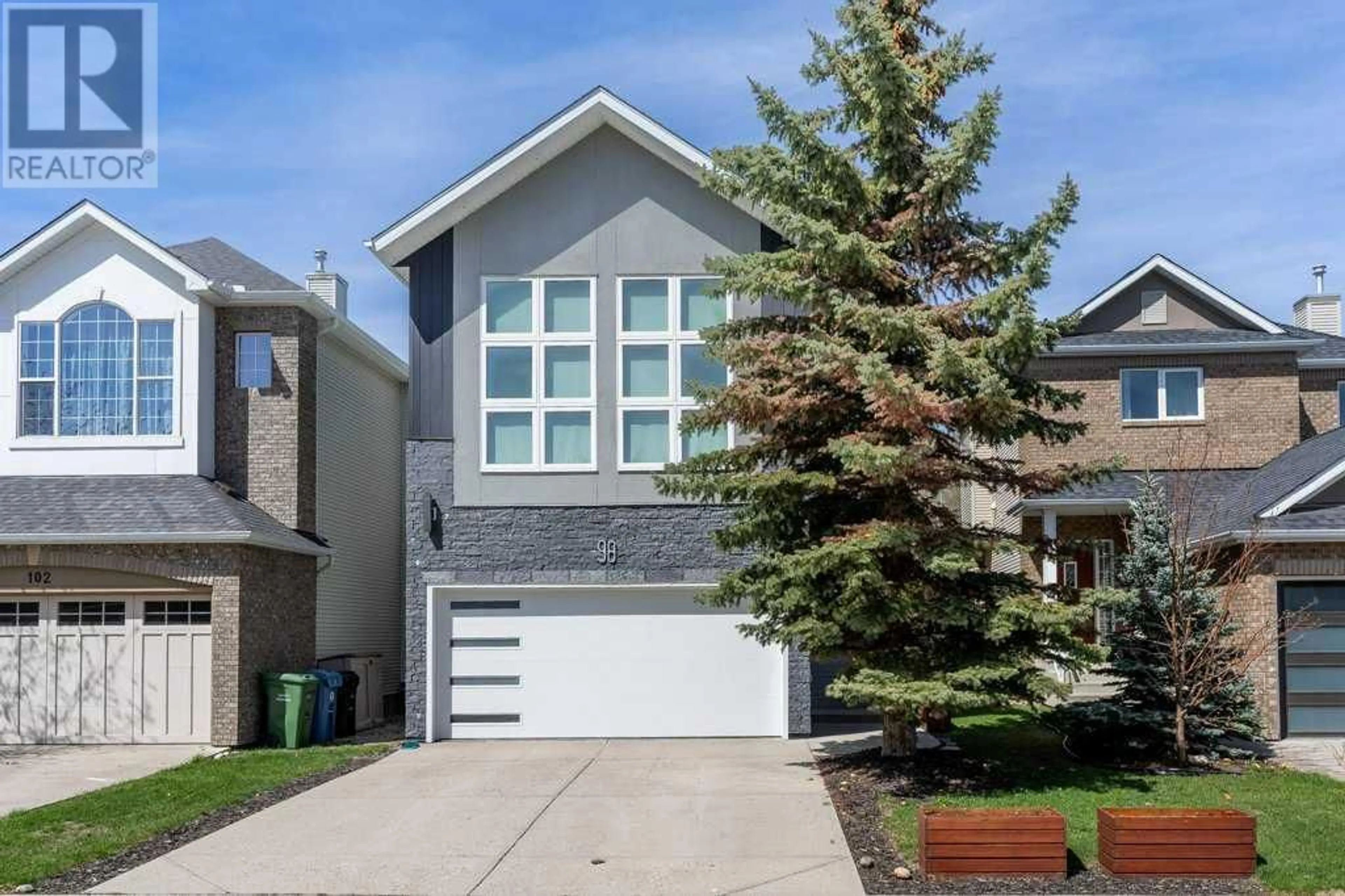 Frontside or backside of a home for 98 Discovery Ridge Gardens SW, Calgary Alberta T3H5L7