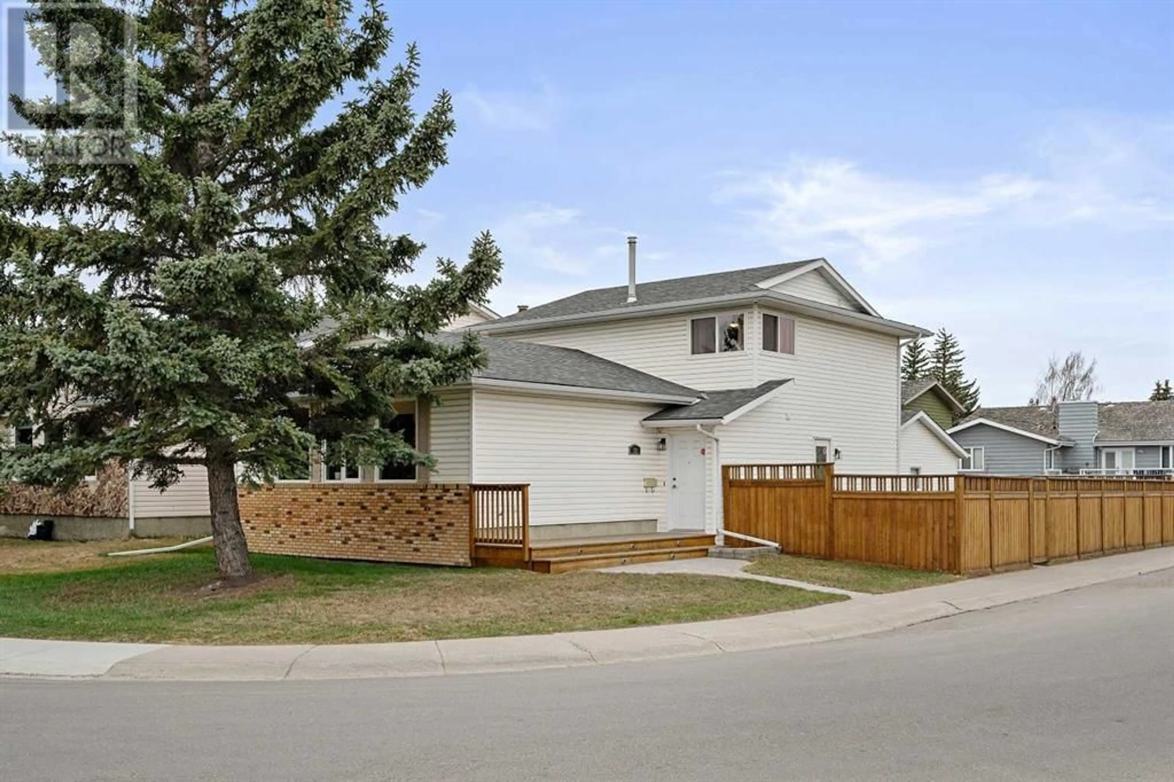 Frontside or backside of a home for 120 Woodglen Way SW, Calgary Alberta T2W4T3