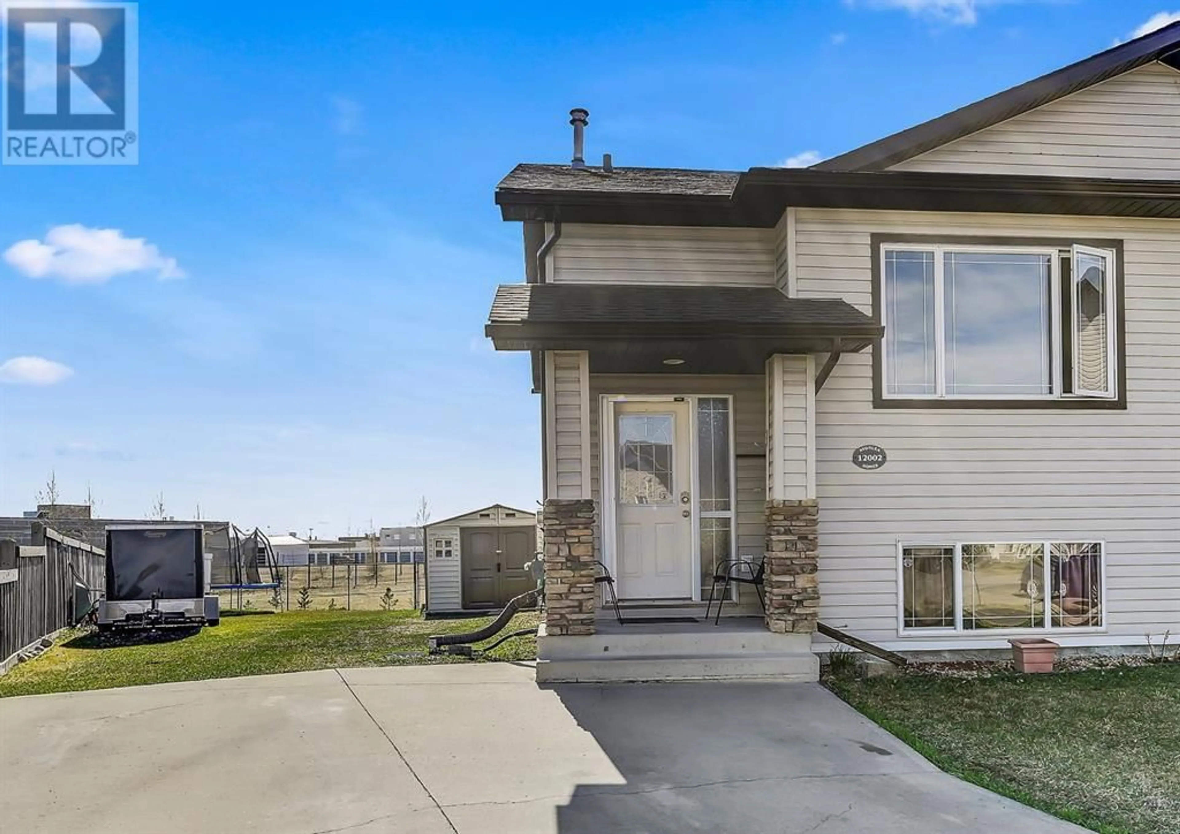 Frontside or backside of a home for 12002 102B Street, Grande Prairie Alberta T8V0A7
