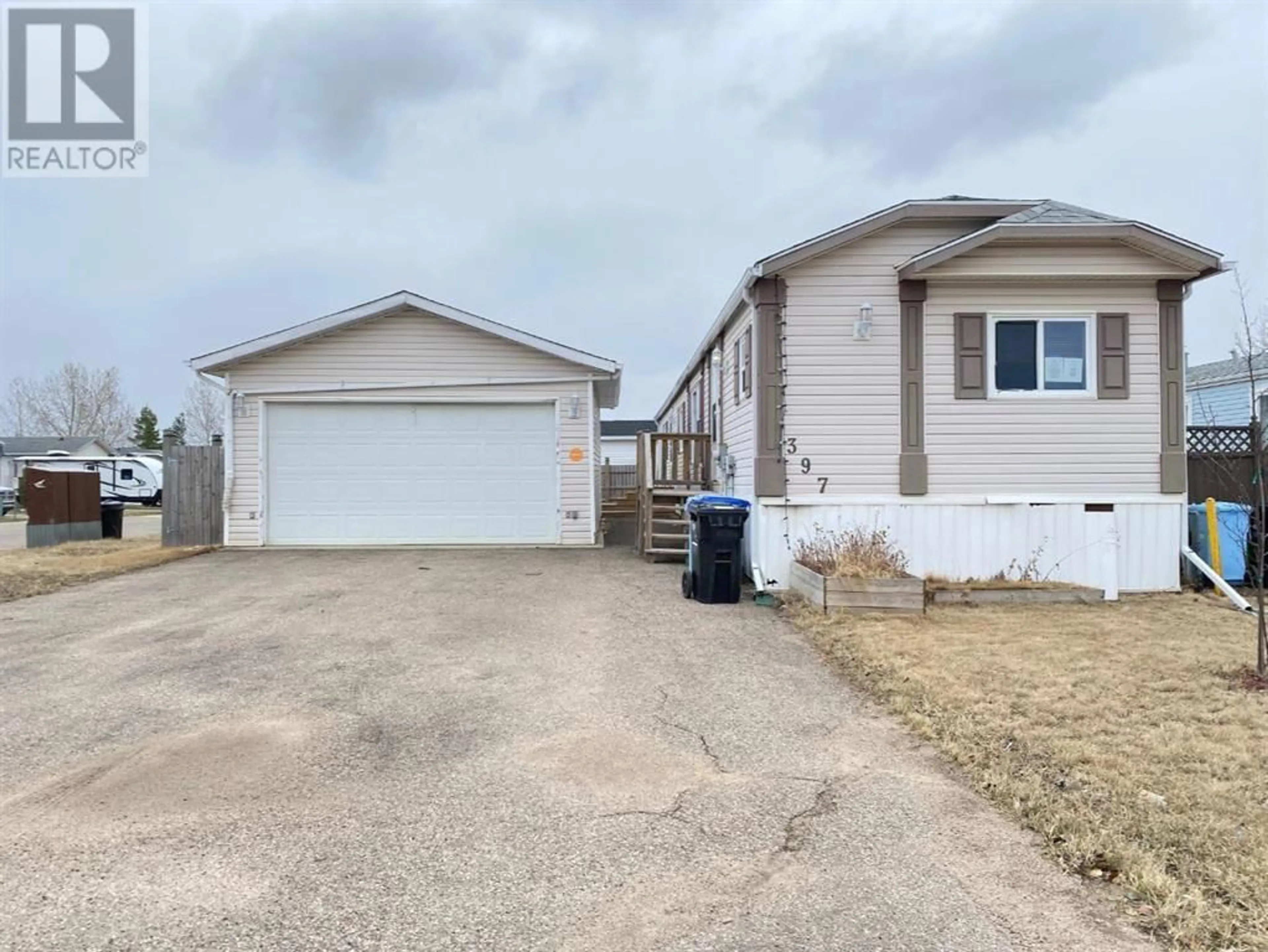 Frontside or backside of a home for 397 Cree Road, Fort McMurray Alberta T9K1Y4