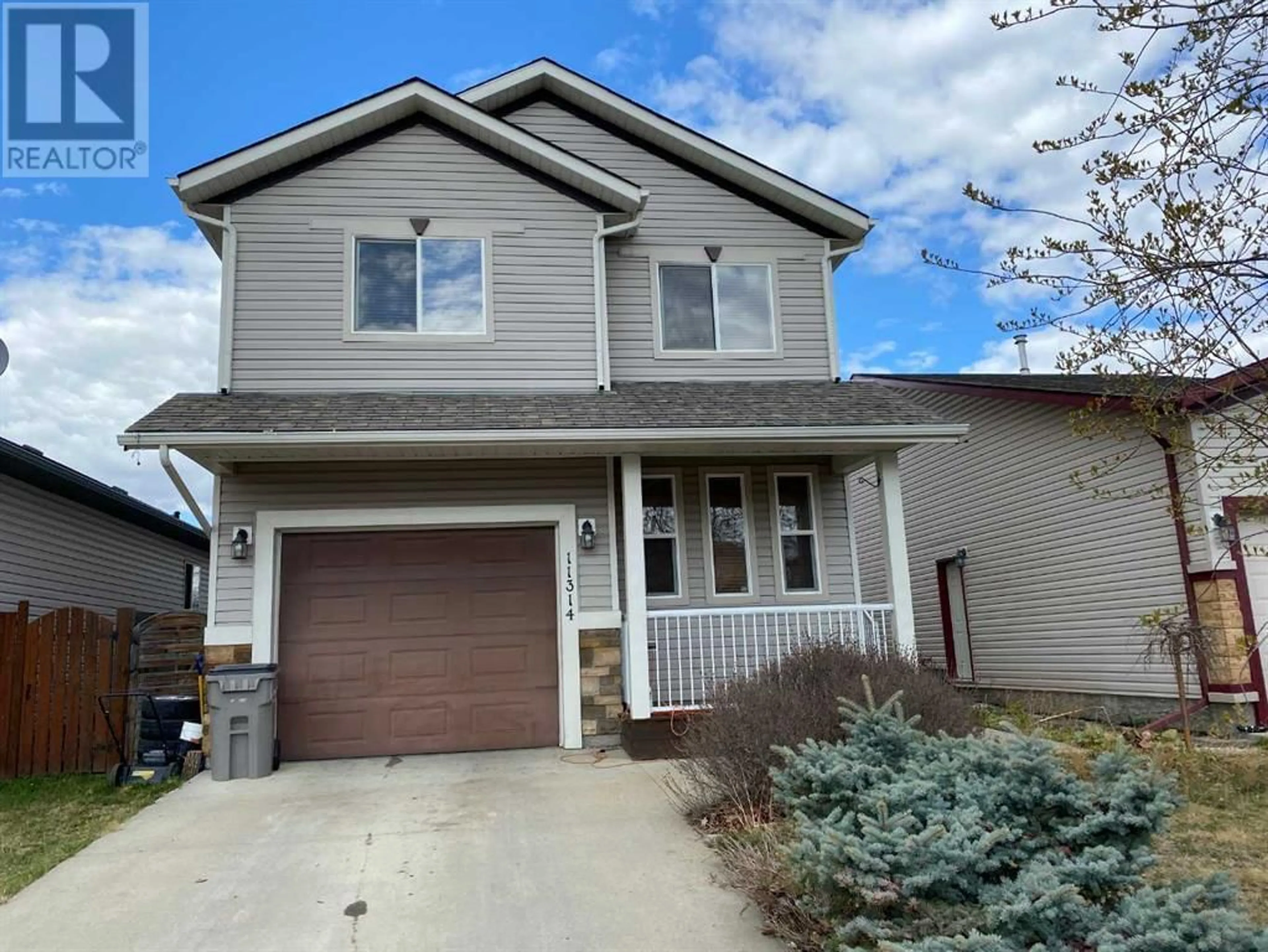 Frontside or backside of a home for 11314 Pinnacle Drive, Grande Prairie Alberta T8W0E4