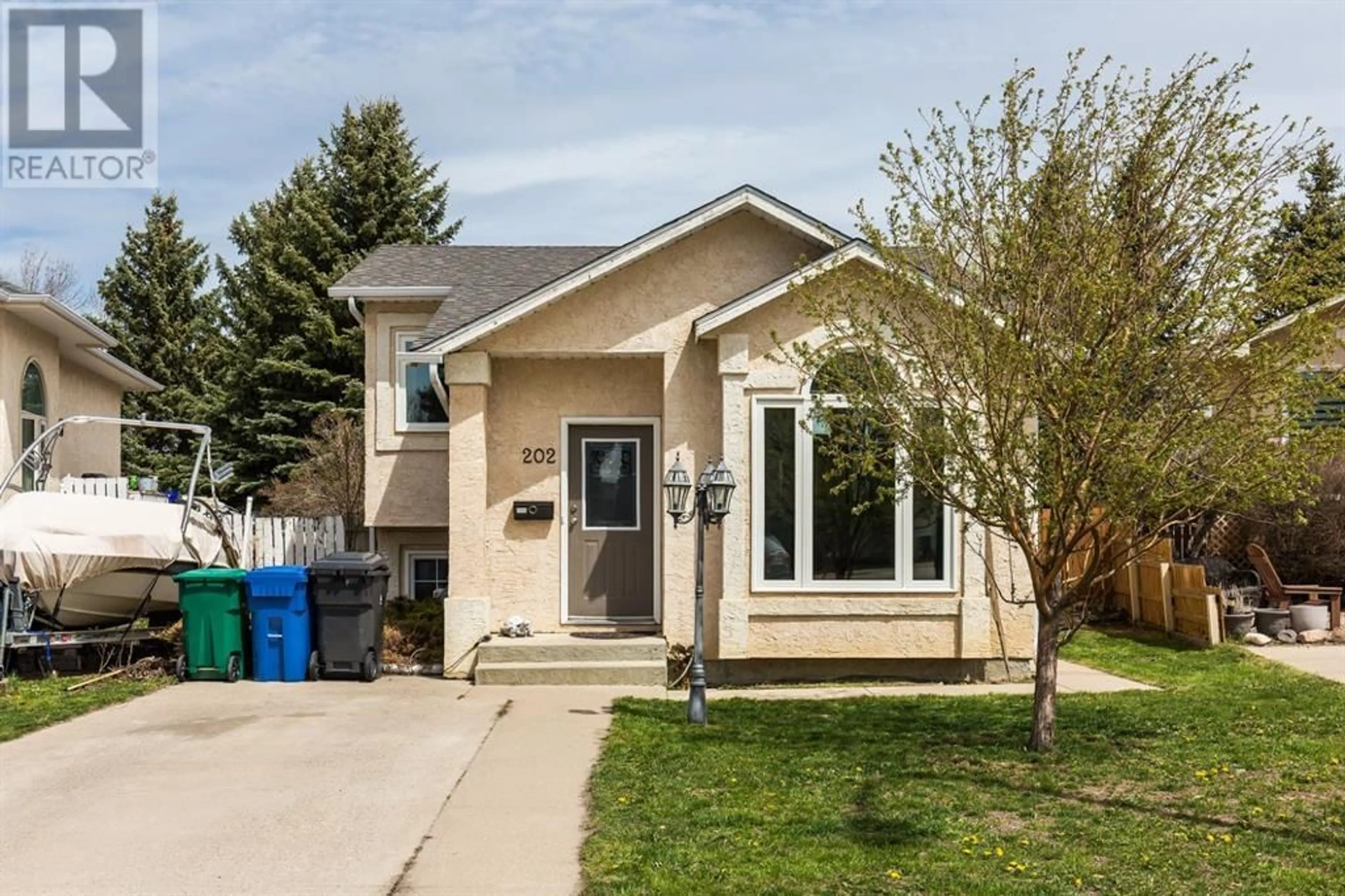 A pic from exterior of the house or condo for 202 Mt Blakiston Road W, Lethbridge Alberta T1K6M5