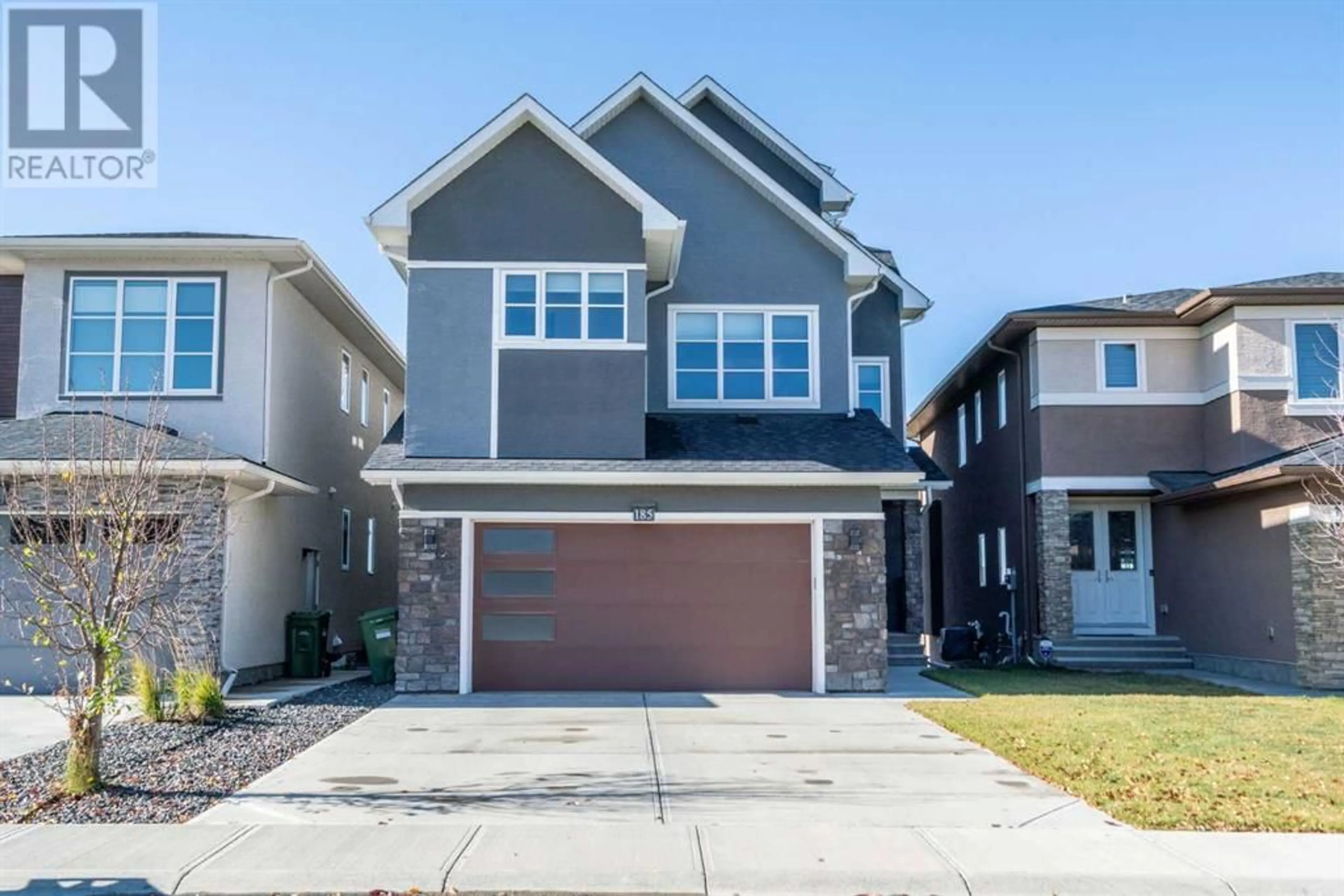 Frontside or backside of a home for 185 Carringvue Manor NW, Calgary Alberta T3P0W2