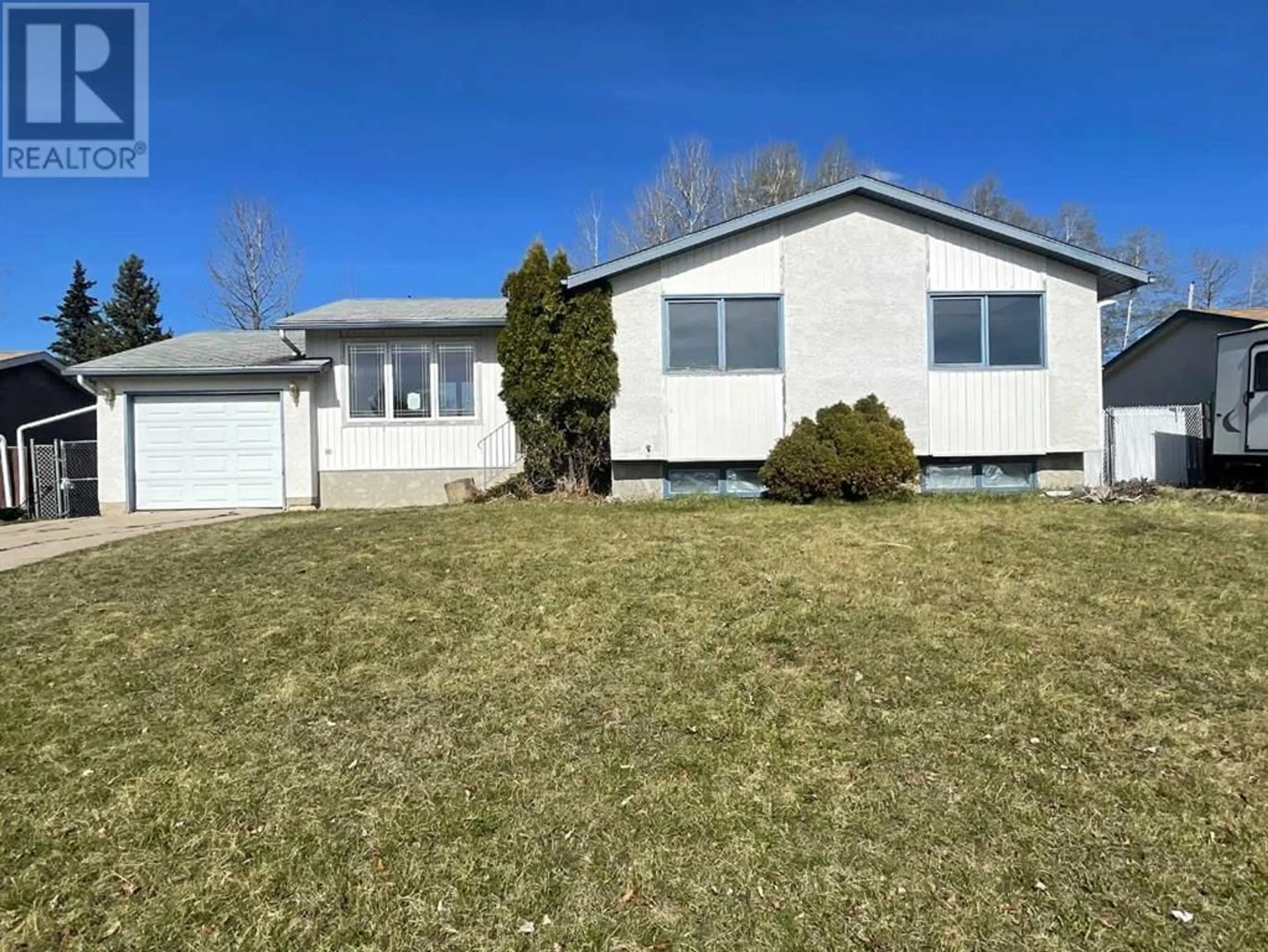 Frontside or backside of a home for 704 7th Avenue, Fox Creek Alberta T0H1P0