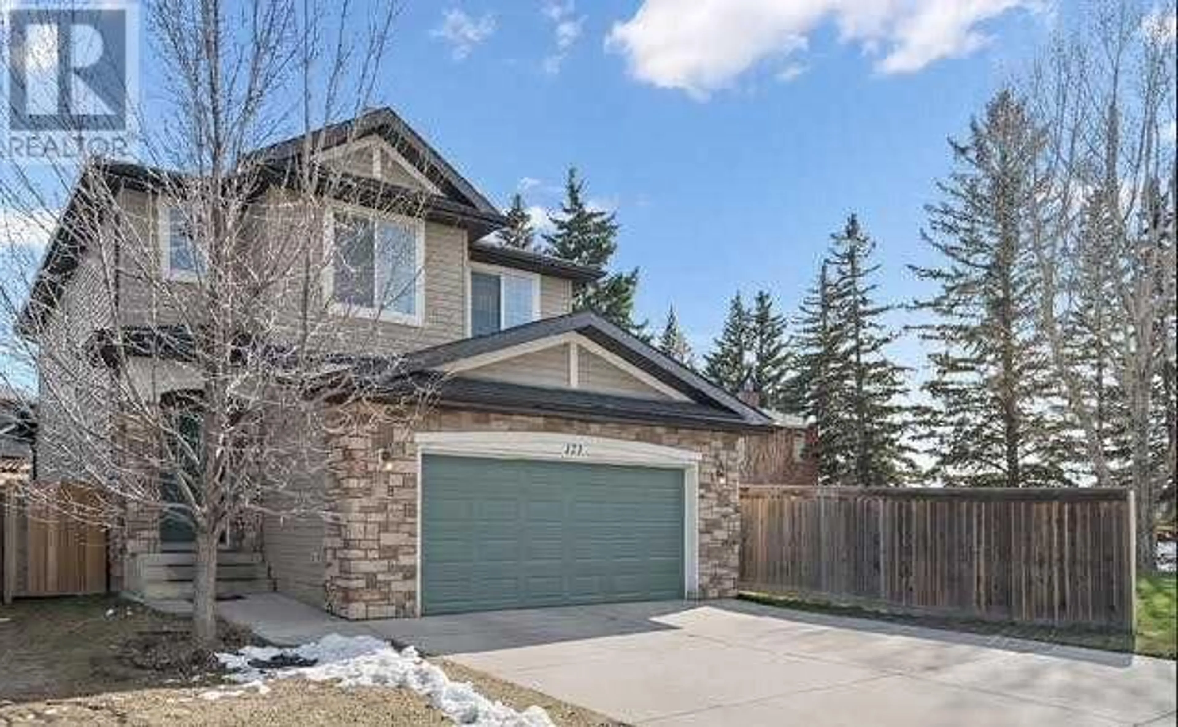 Frontside or backside of a home for 121 Bridleridge Heights SW, Calgary Alberta T2Y5H4