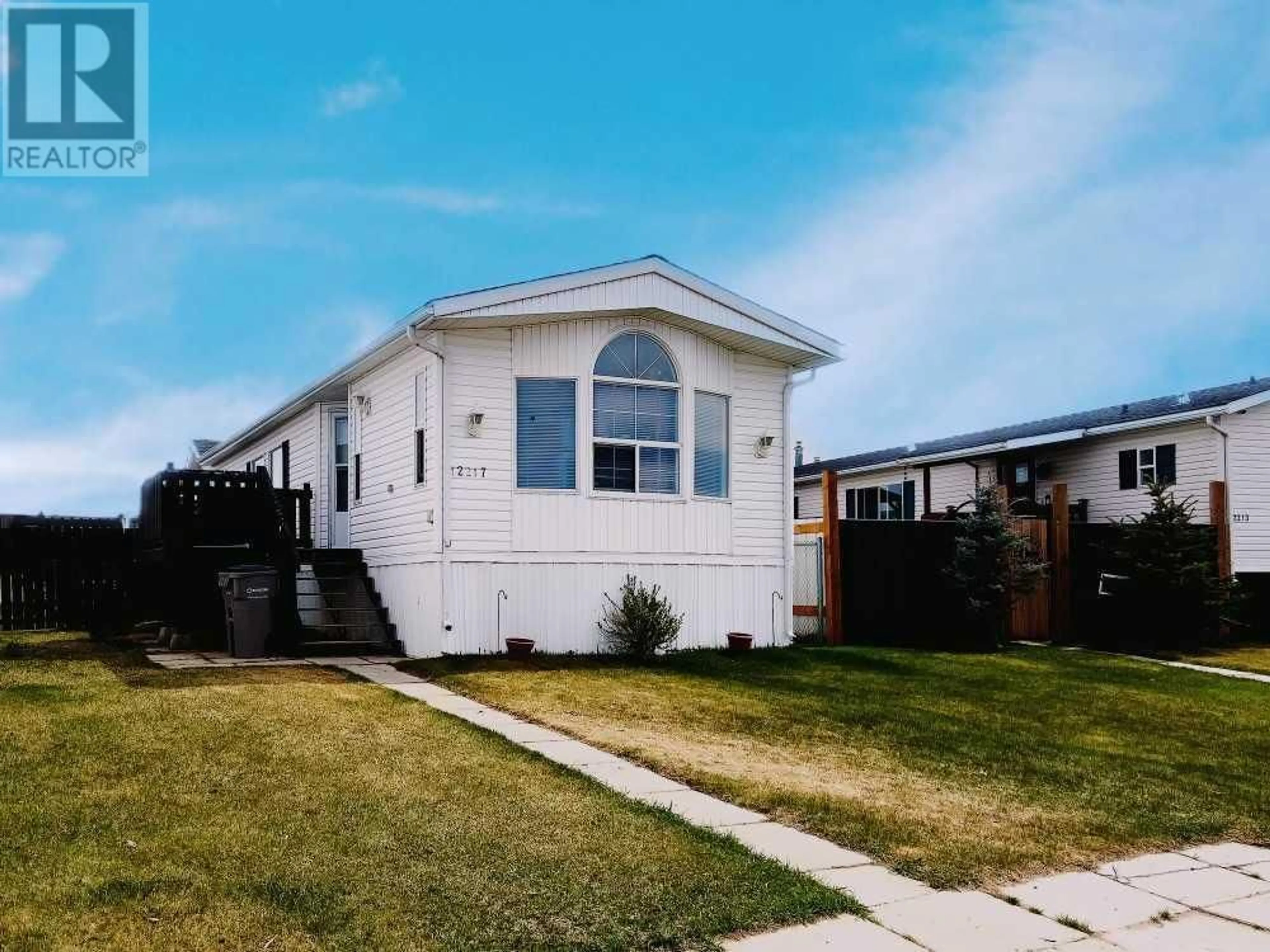Frontside or backside of a home for 12217 98 Street, Grande Prairie Alberta T8V7M7
