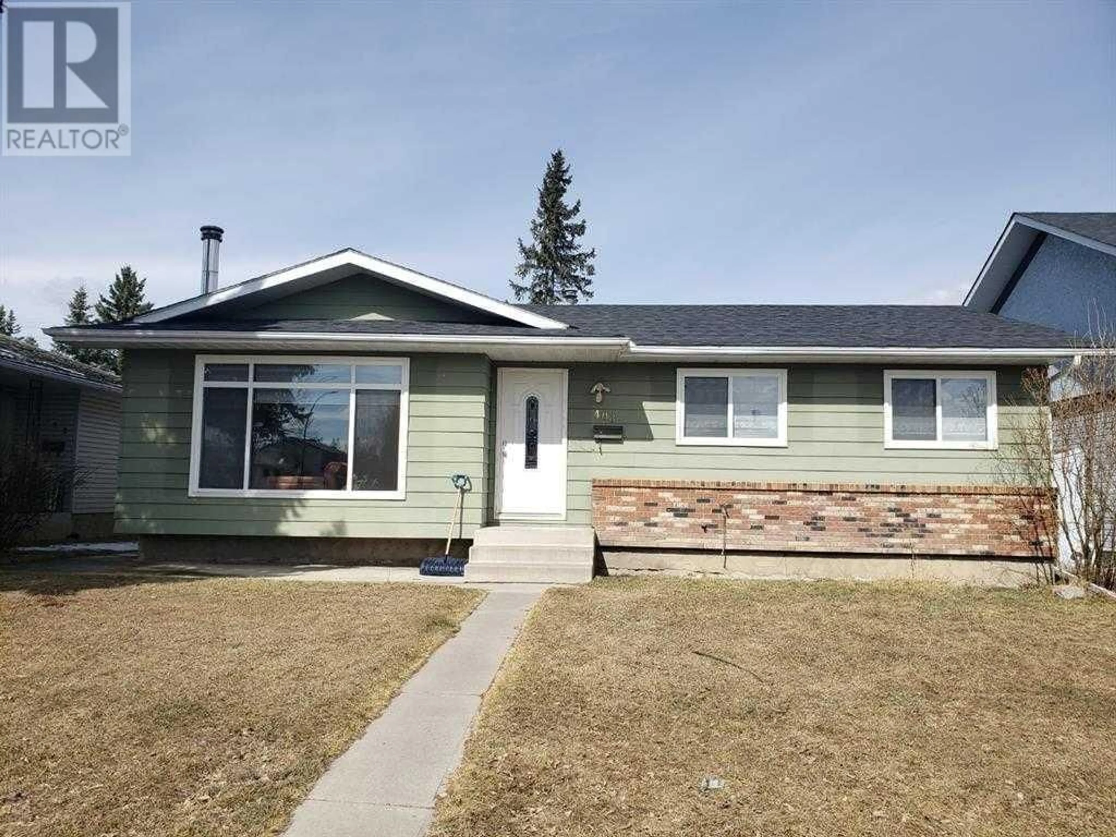 Frontside or backside of a home for 408 Whiteside Road NE, Calgary Alberta T1Y2Z7