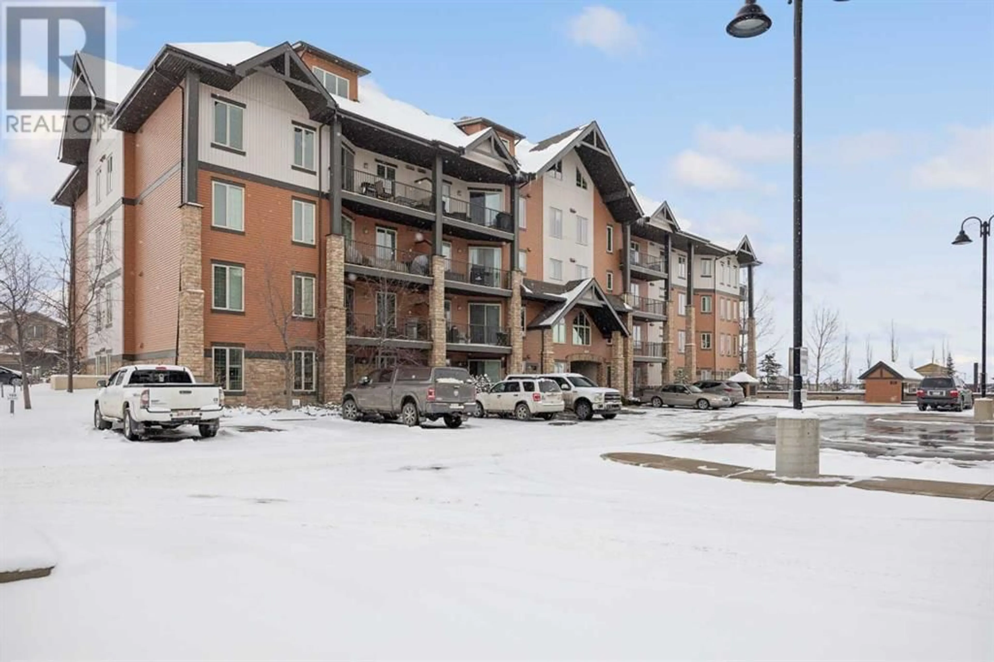 A pic from exterior of the house or condo for 3204 15 Sunset Square, Cochrane Alberta T4C0E7