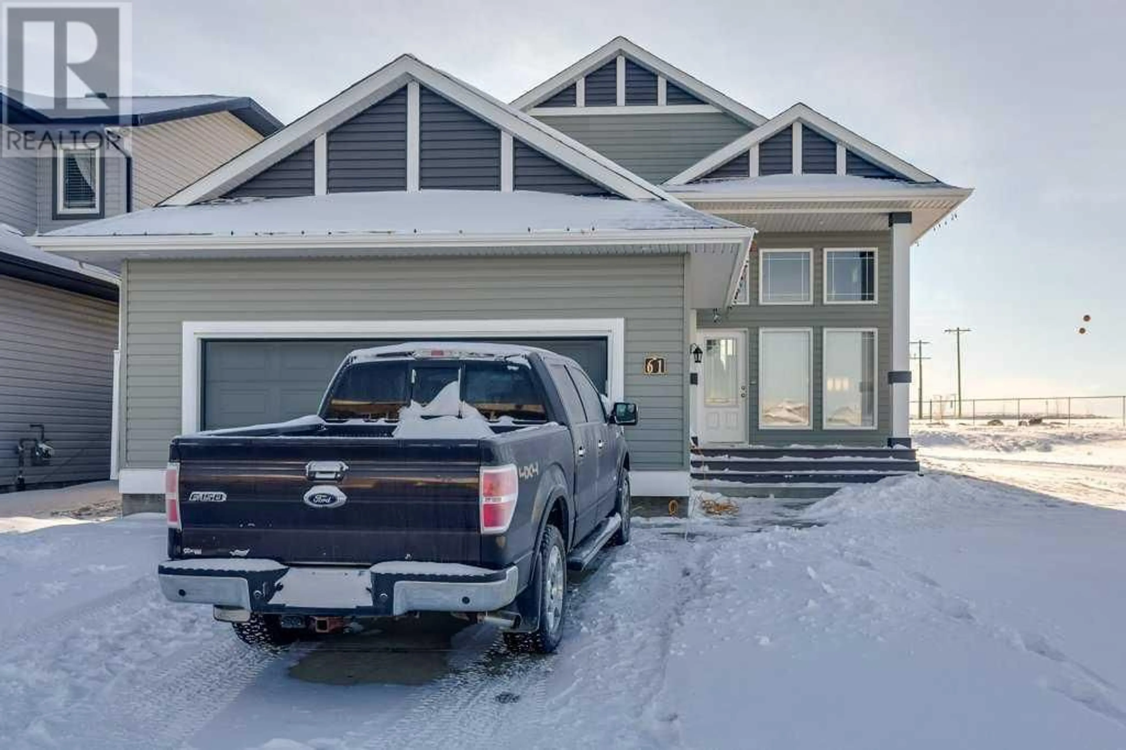 Frontside or backside of a home for 61 Bowman Circle, Sylvan Lake Alberta T4S0H9