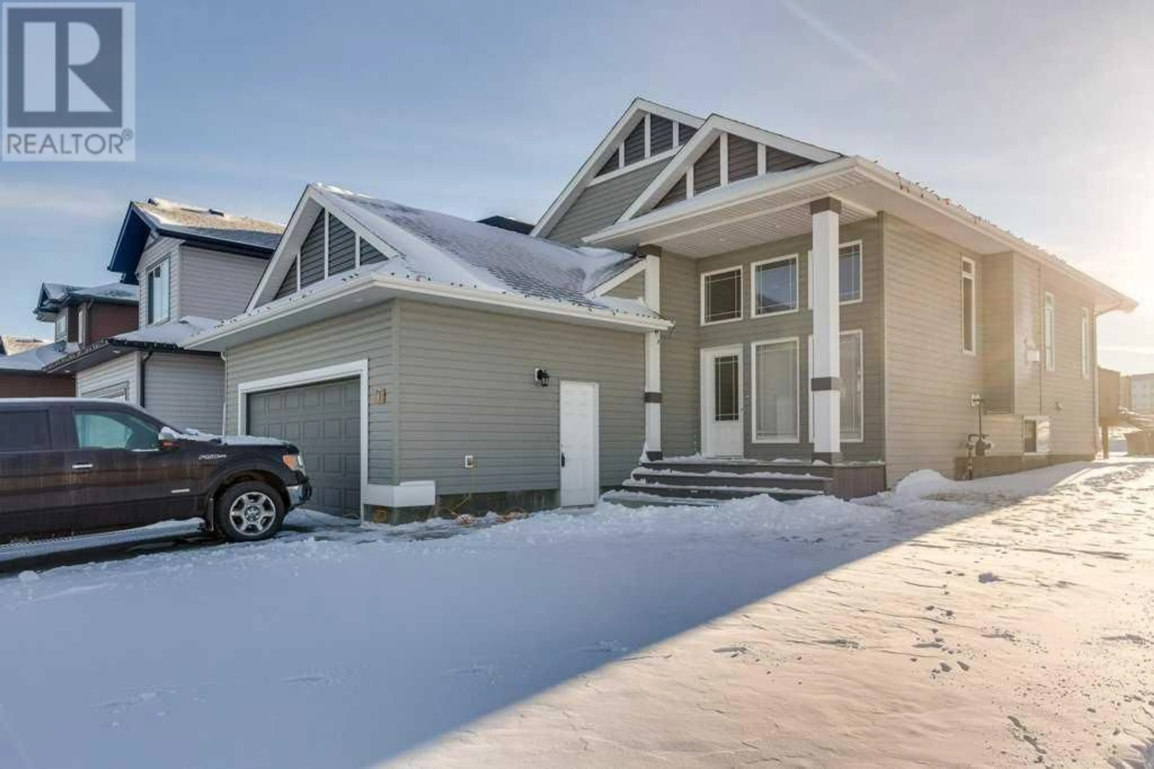 Frontside or backside of a home for 61 Bowman Circle, Sylvan Lake Alberta T4S0H9