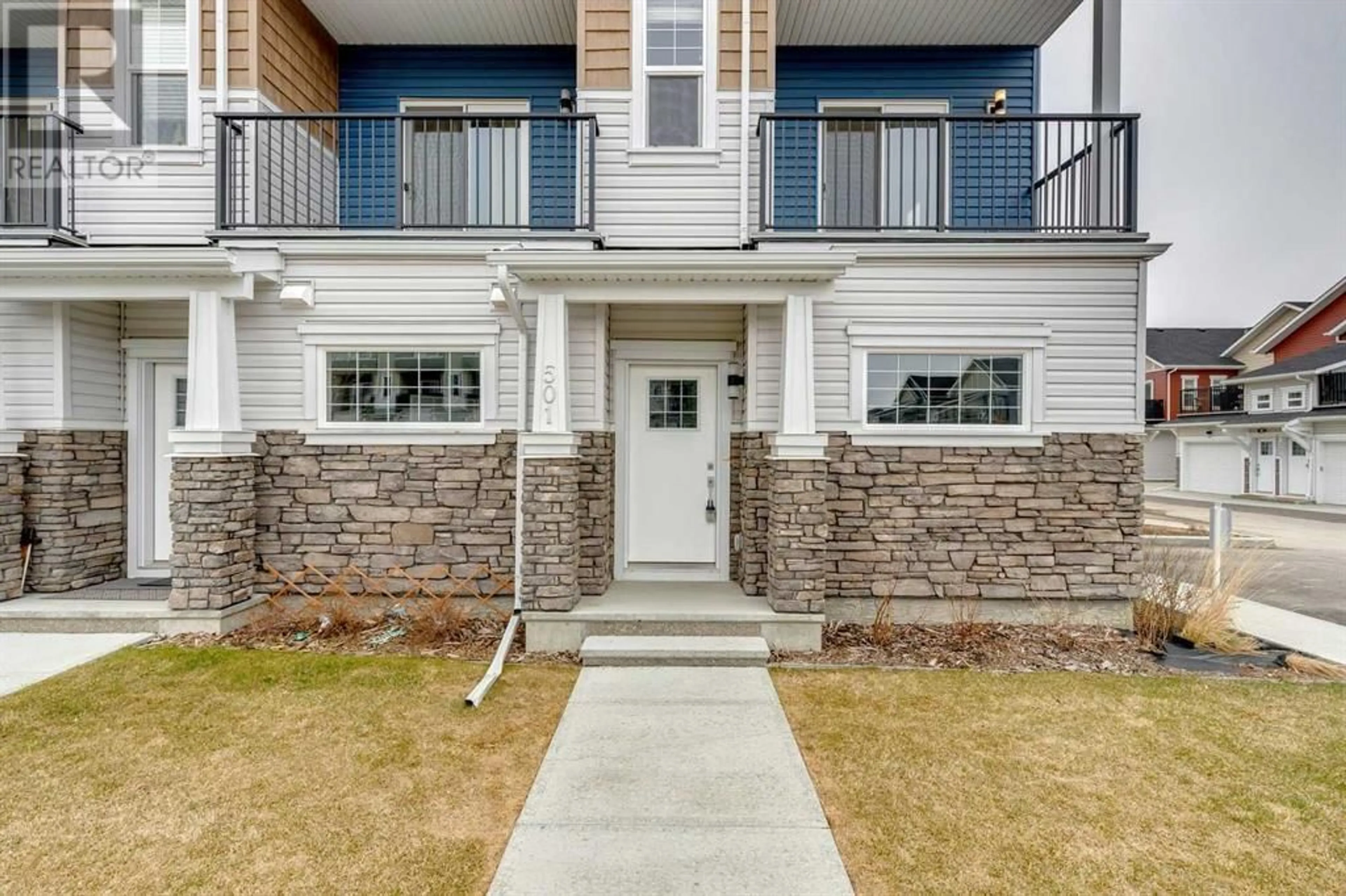 A pic from exterior of the house or condo for 501 115 Sagewood Drive SW, Airdrie Alberta T4B4v6