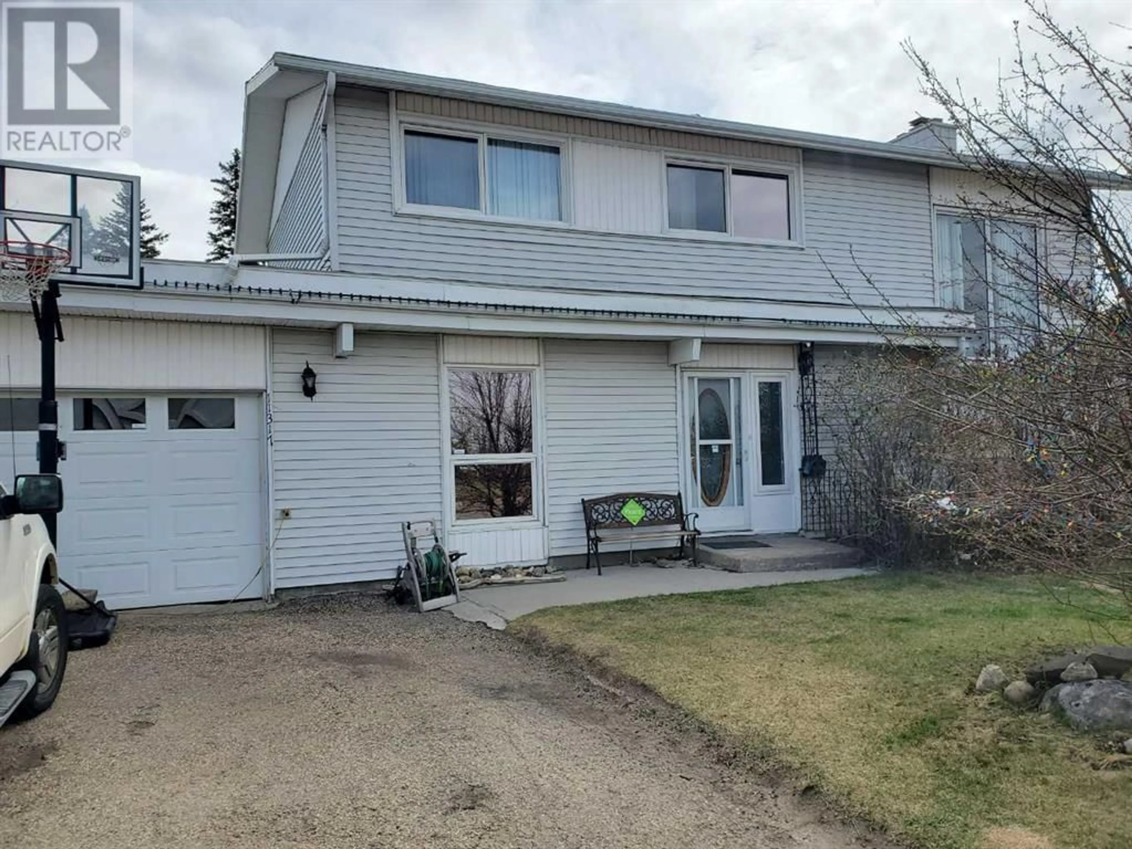 Frontside or backside of a home for 11317 104 Street, Grande Prairie Alberta T8V2Y9