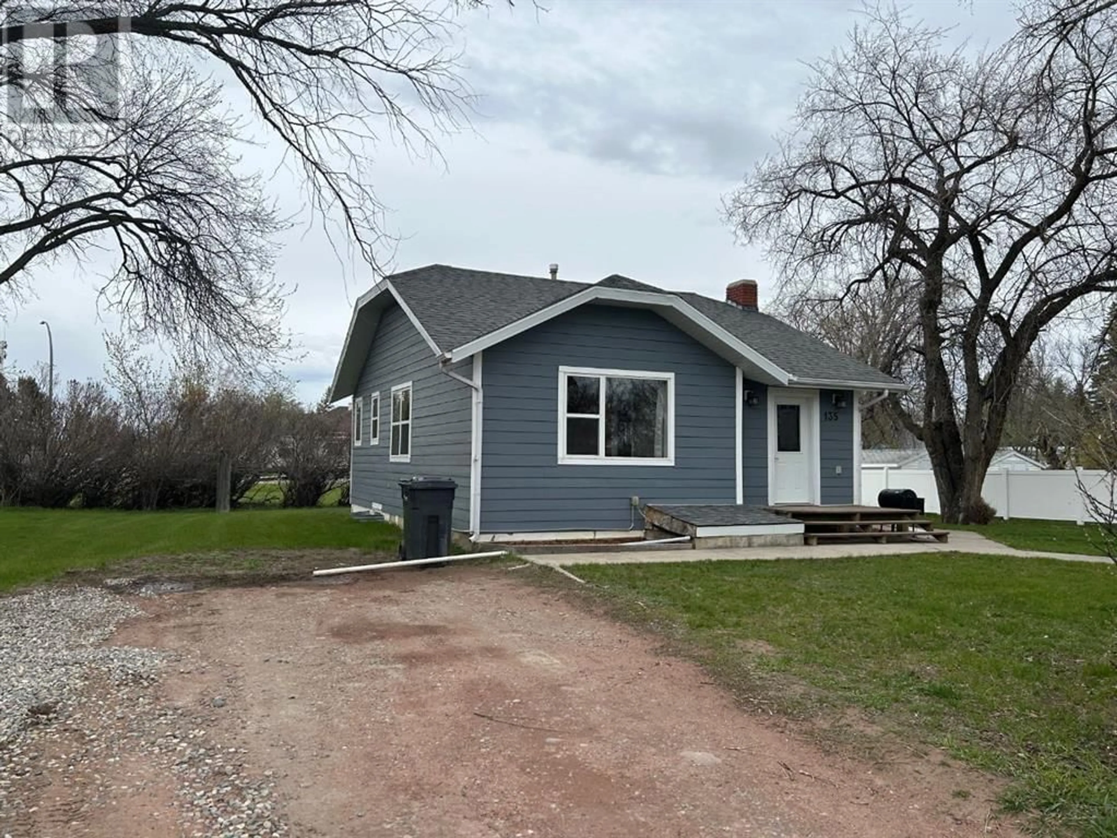 Frontside or backside of a home for 135 W 2 Avenue S, Magrath Alberta T0K1J0