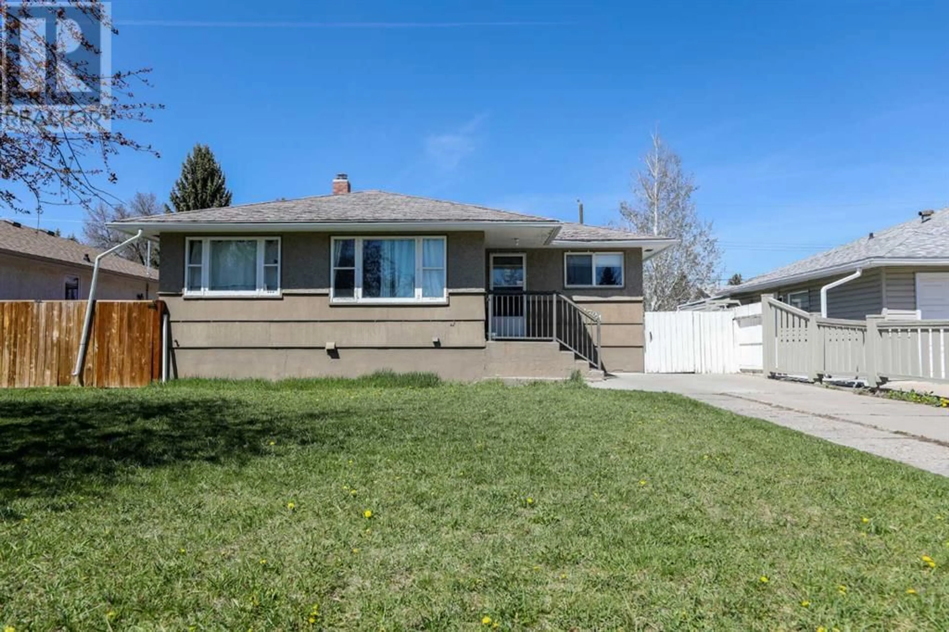 Frontside or backside of a home for 1721 14 Avenue S, Lethbridge Alberta T1K0T8