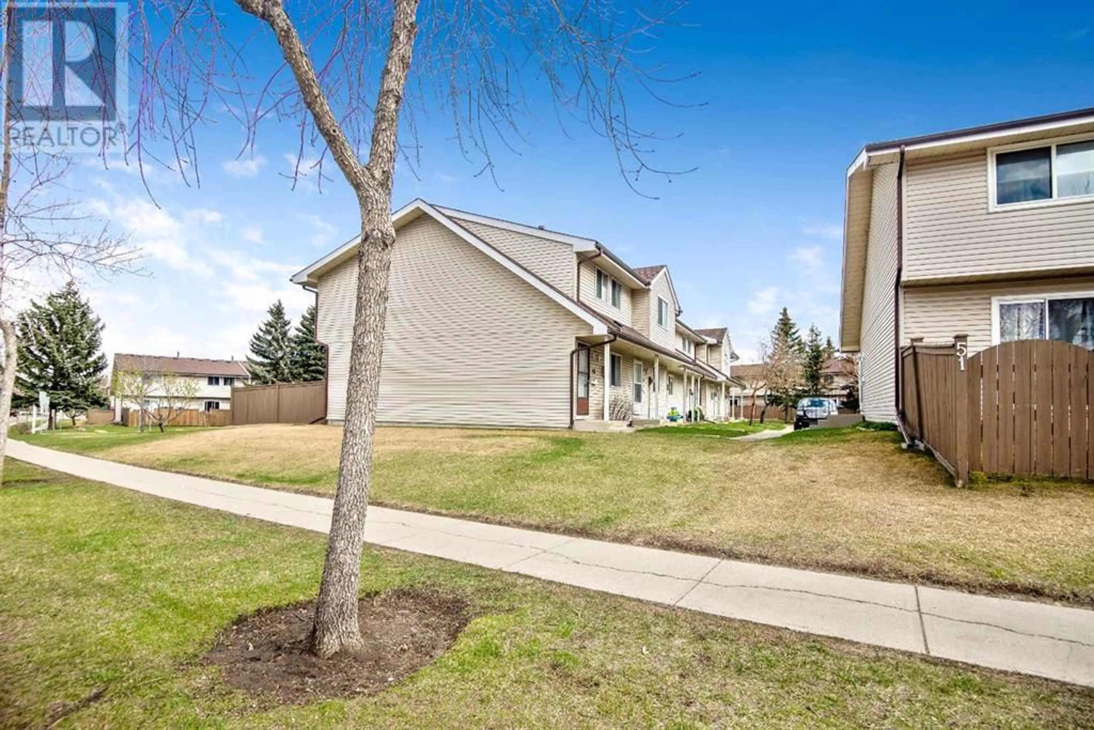 A pic from exterior of the house or condo for 45 1515 Falconridge Drive NE, Calgary Alberta T3J1L8