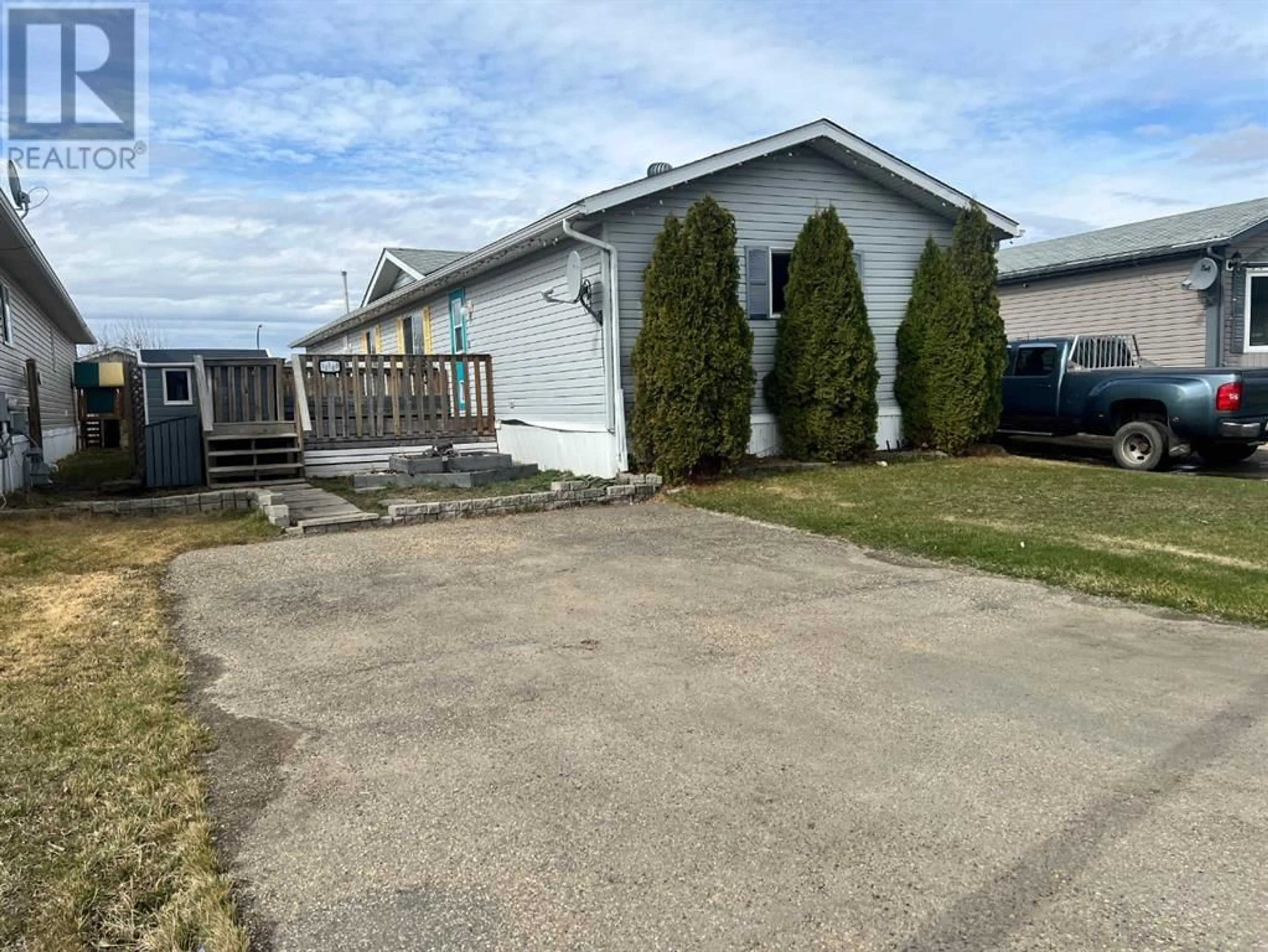 Frontside or backside of a home for 11108 96 Street, Clairmont Alberta T0H0W3