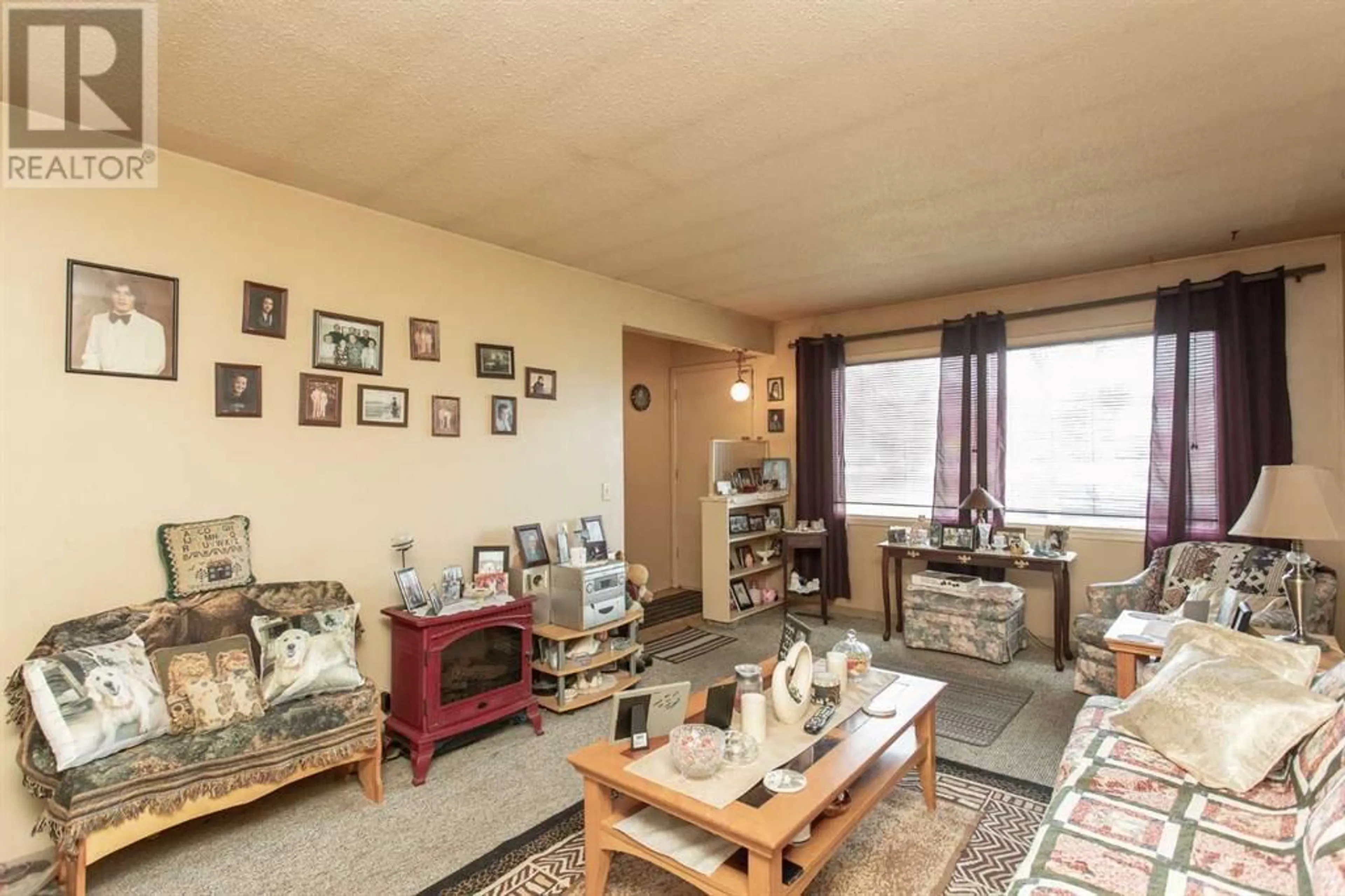 Living room for 5407 50 Street, Lacombe Alberta T4L1H7