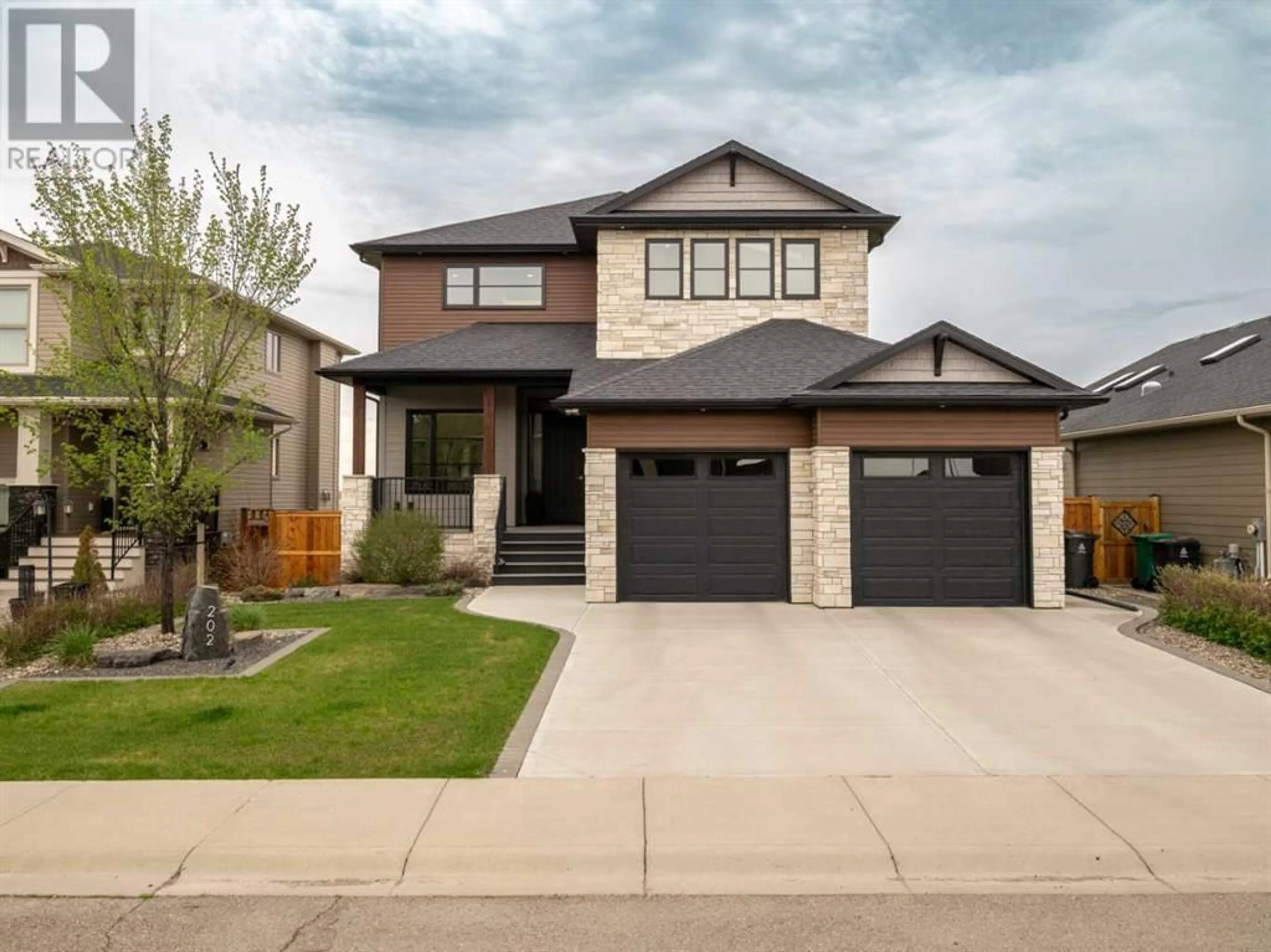 Frontside or backside of a home for 202 Canyon Estates Way W, Lethbridge Alberta T1K7A4