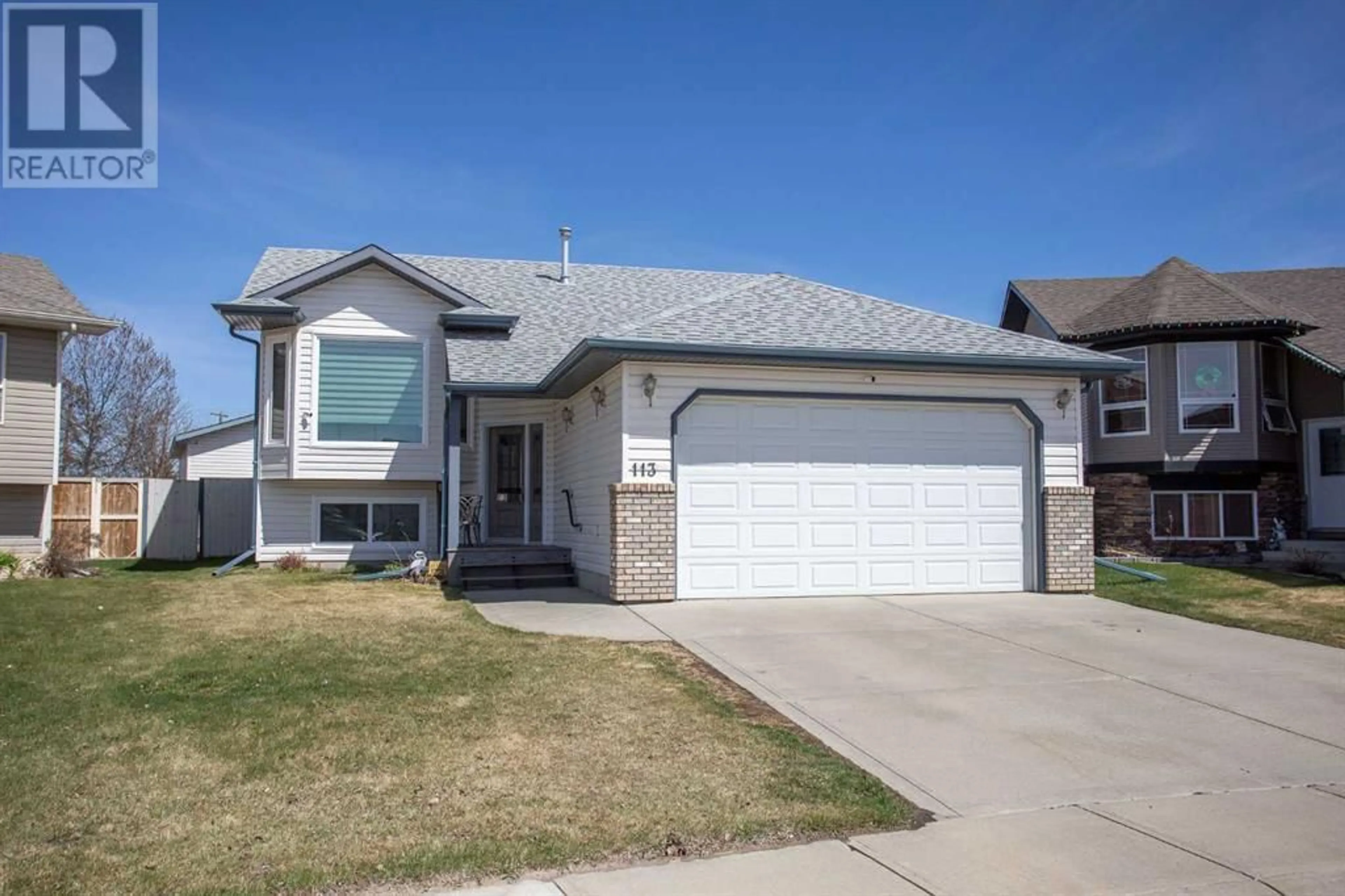 Frontside or backside of a home for 113 Downing Close, Red Deer Alberta T4R3K1