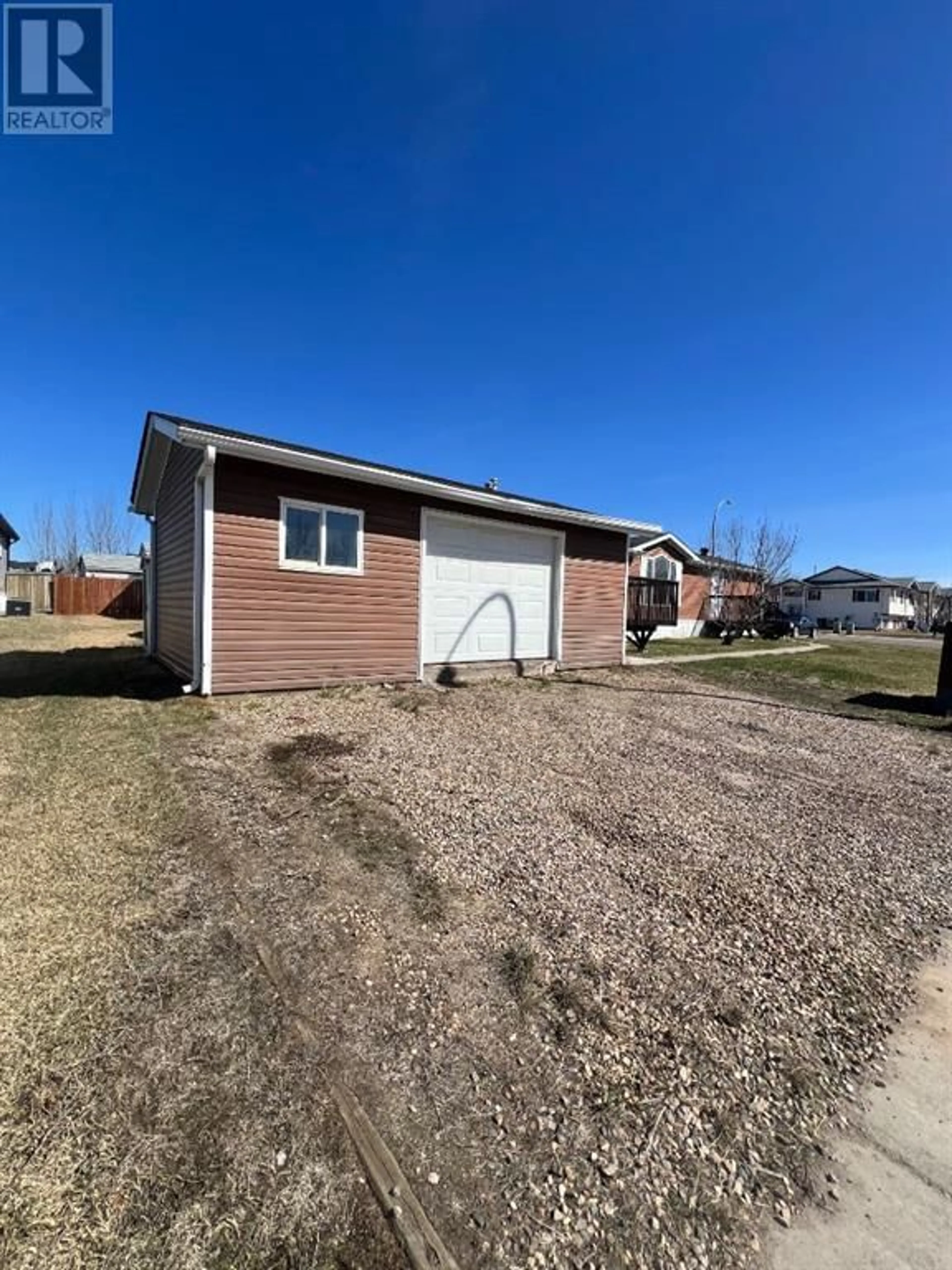Frontside or backside of a home for 100 Arabian Drive, Fort McMurray Alberta T9H5K4