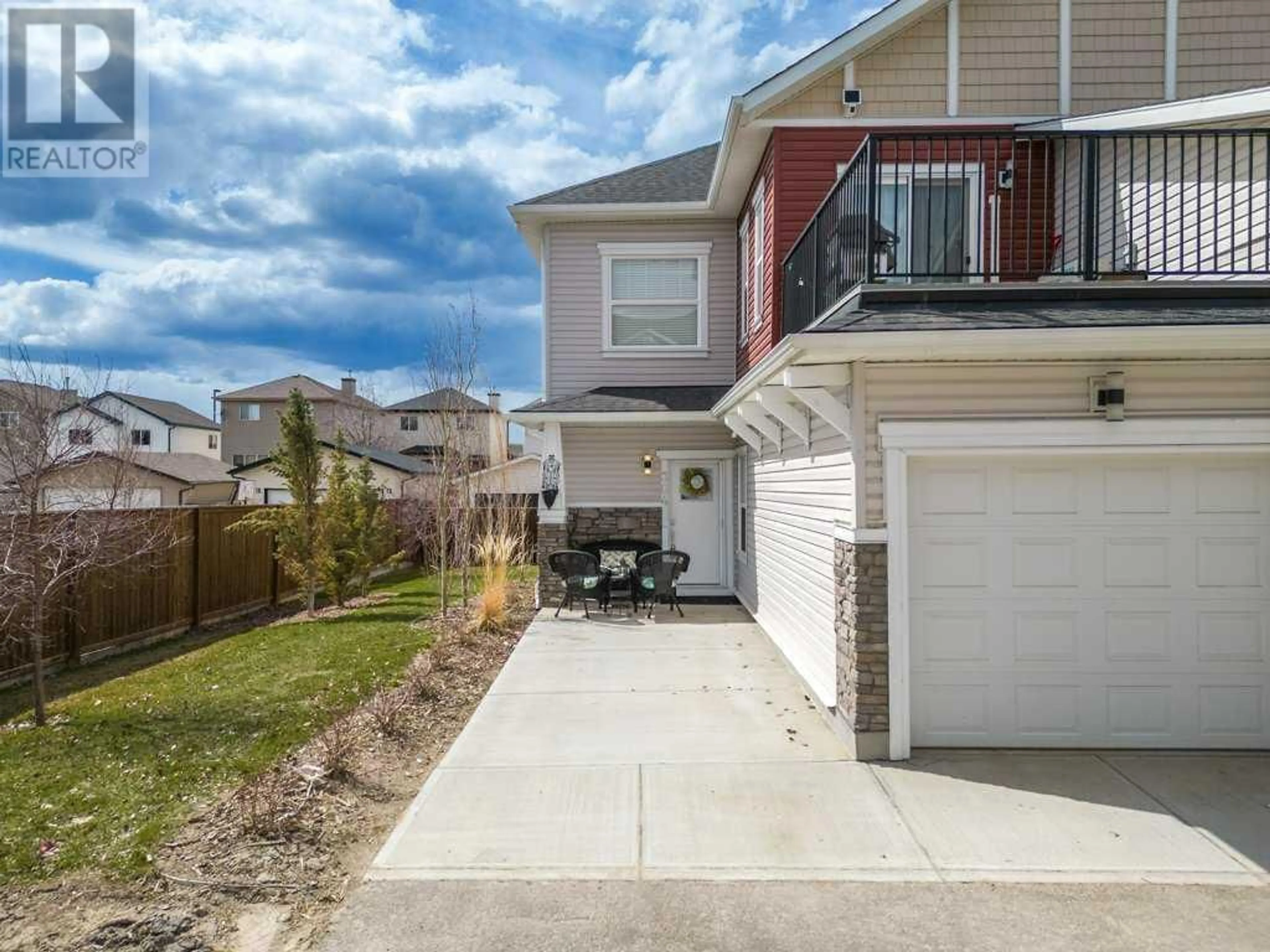 A pic from exterior of the house or condo for 304 115 Sagewood Drive SW, Airdrie Alberta T4B4V5