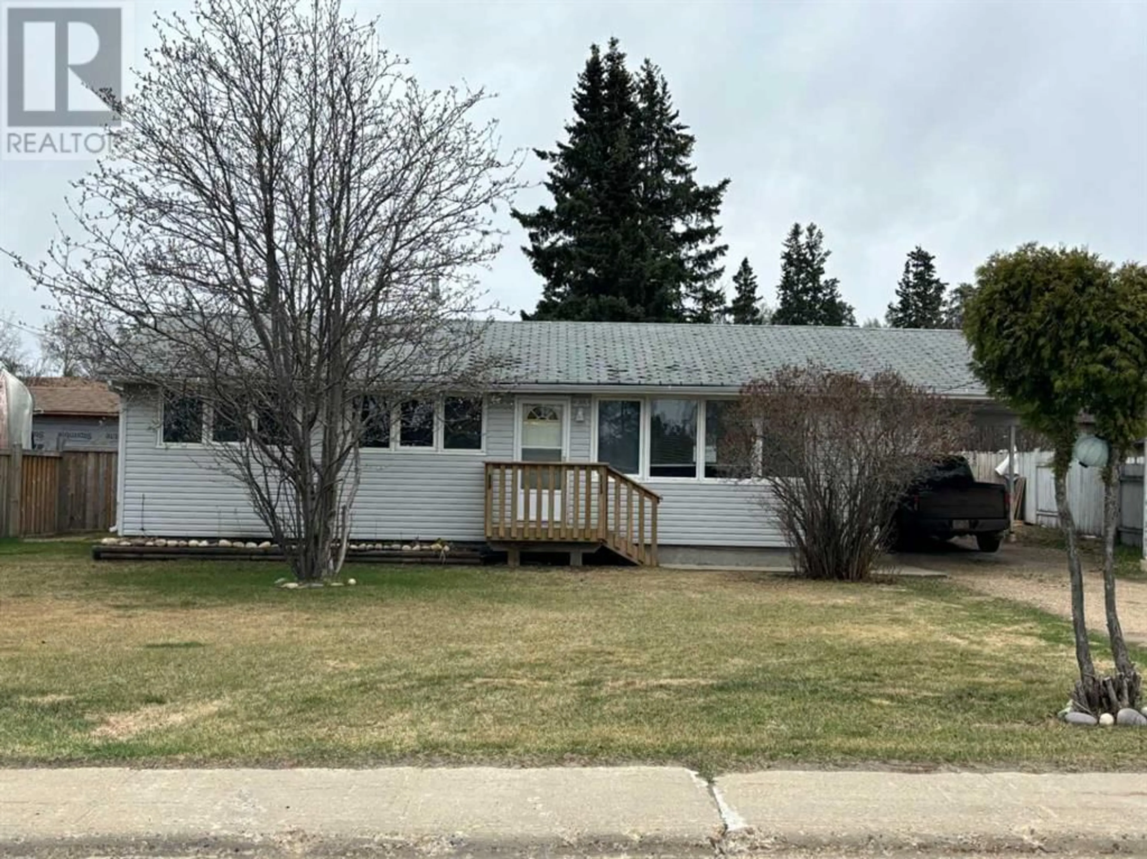 Frontside or backside of a home for 23 Sandy Drive, Whitecourt Alberta T7S1G8