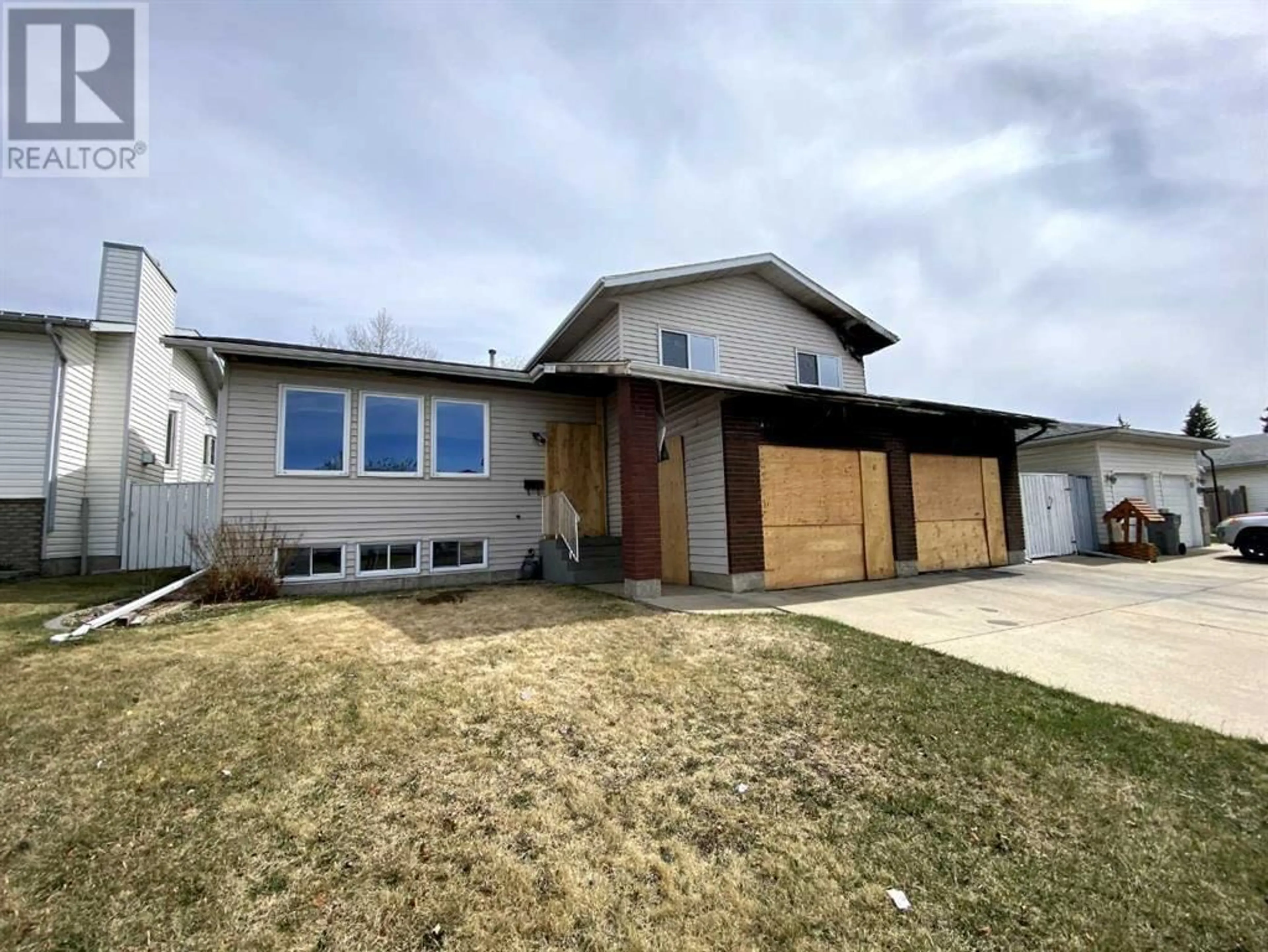 Frontside or backside of a home for 11313 94A Street, Grande Prairie Alberta T8V6T6
