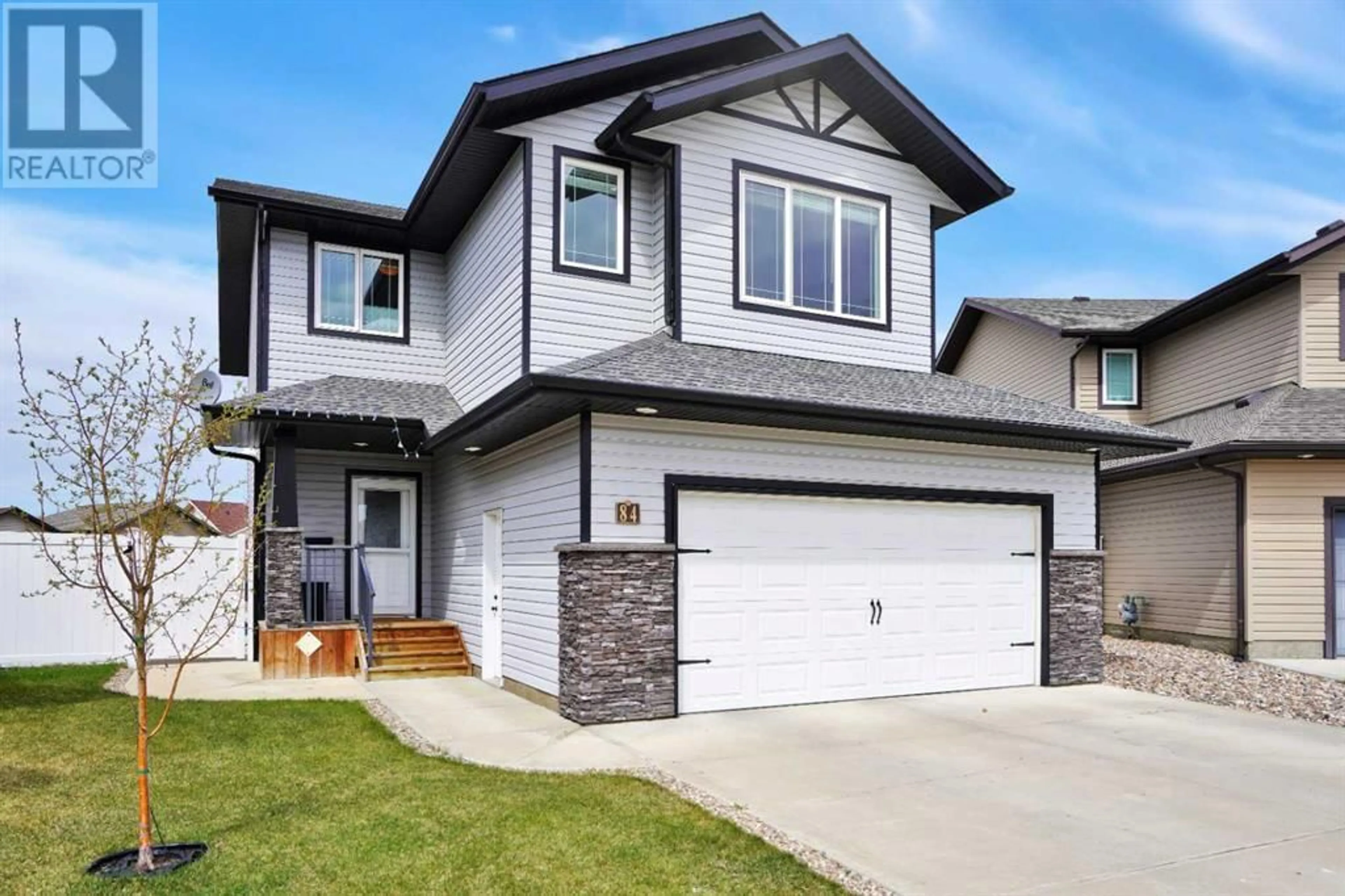 Frontside or backside of a home for 84 Kershaw Close, Red Deer Alberta T4P0H3