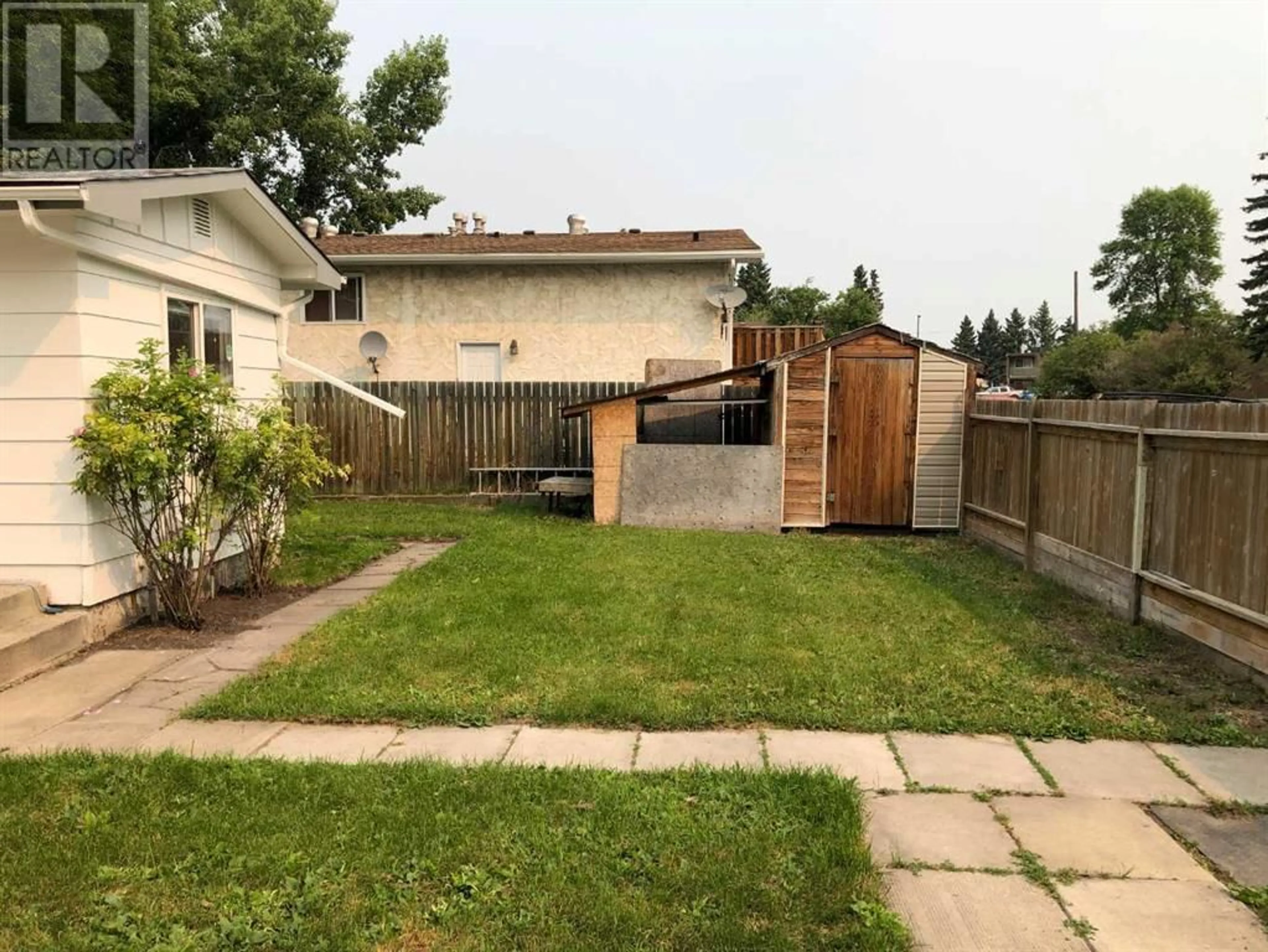 Fenced yard for 6335 59 Avenue, Red Deer Alberta T4N5P9