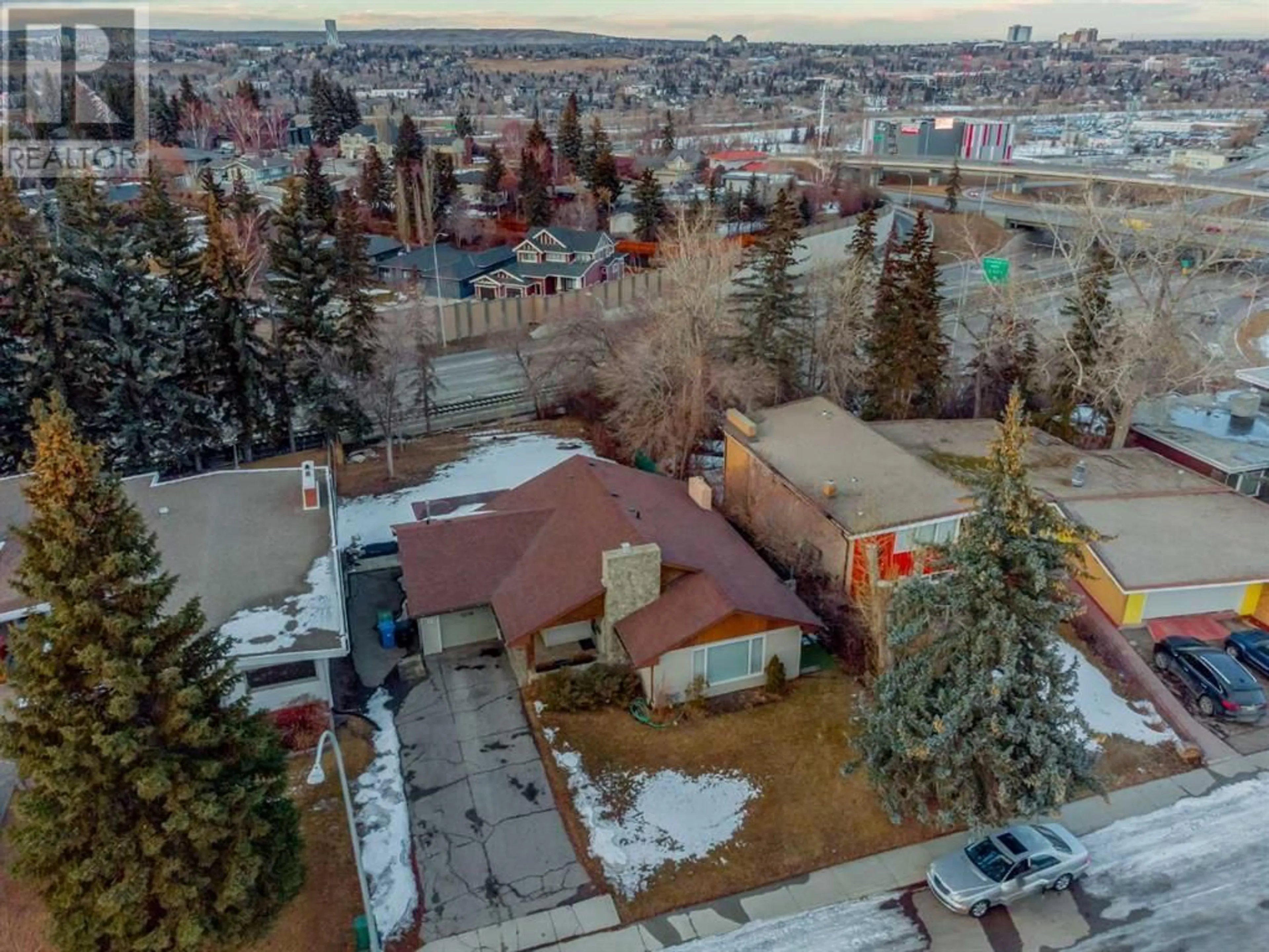 A pic from exterior of the house or condo for 2316 State Road SW, Calgary Alberta T3C3M6