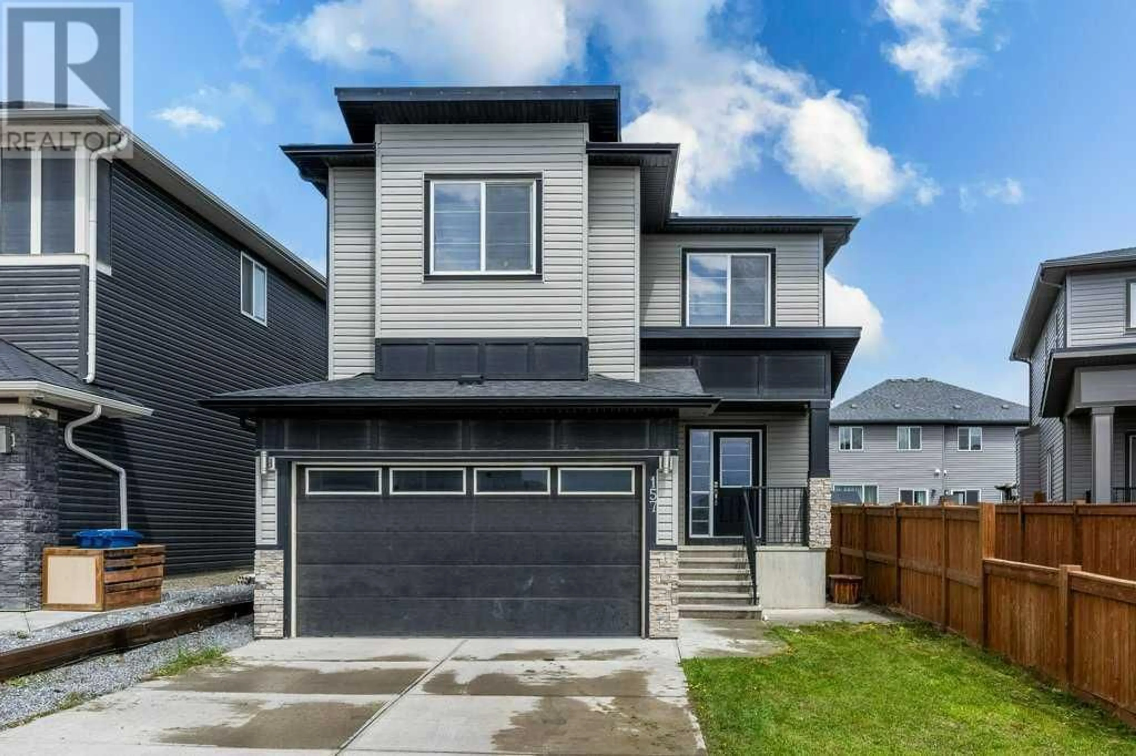 Frontside or backside of a home for 157 Baysprings Gardens SW, Airdrie Alberta T4B5C5